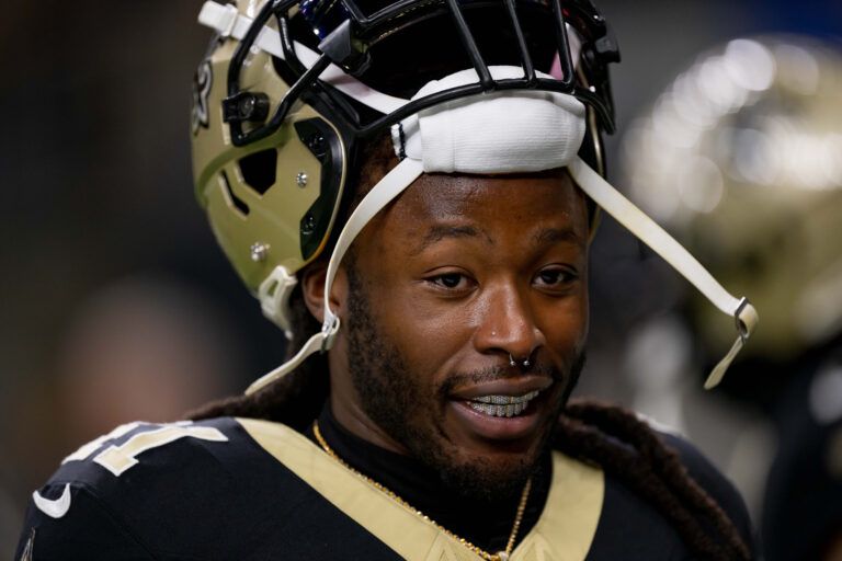 New Orleans Saints running back Alvin Kamara (41) chats before a game against the Los Angeles Rams at Caesars Superdome.