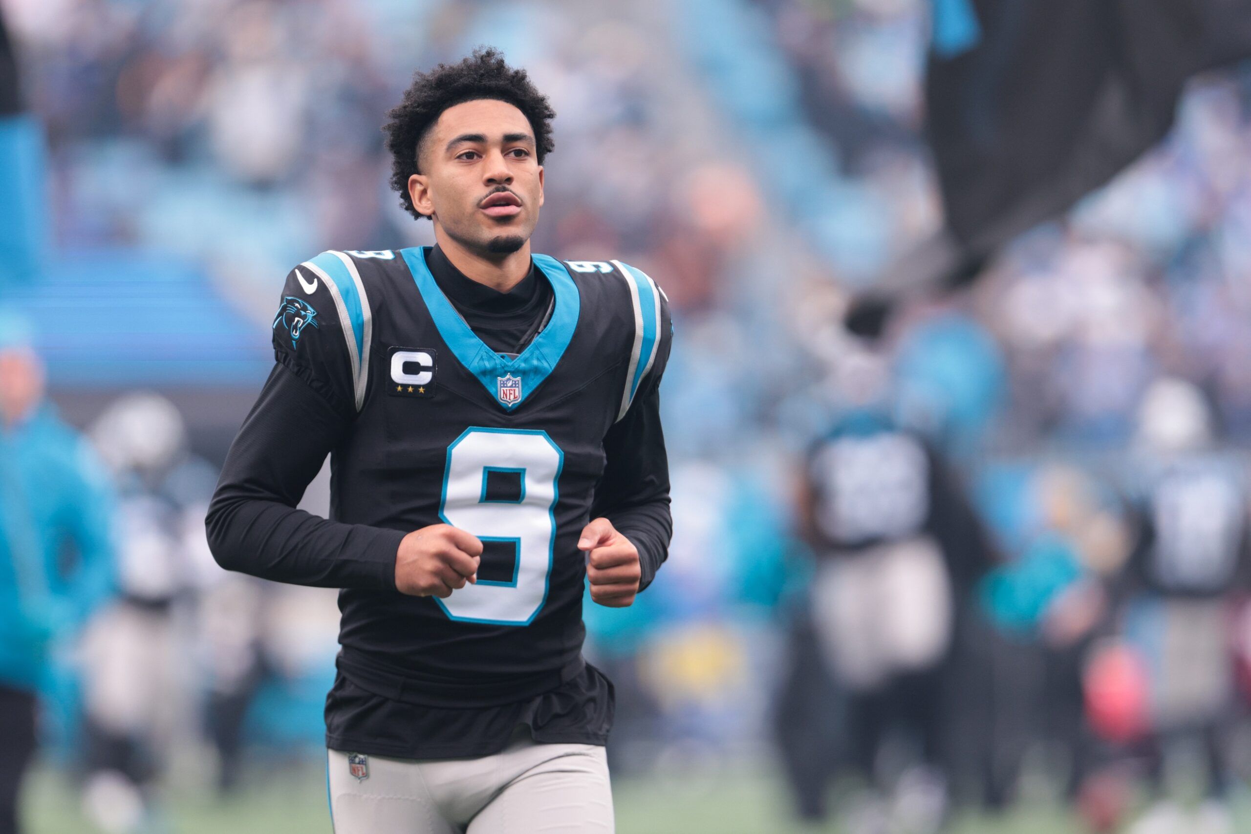 Carolina Panthers quarterback Bryce Young (9) takes the field before the game against the Los Angeles Rams at Bank of America Stadium.