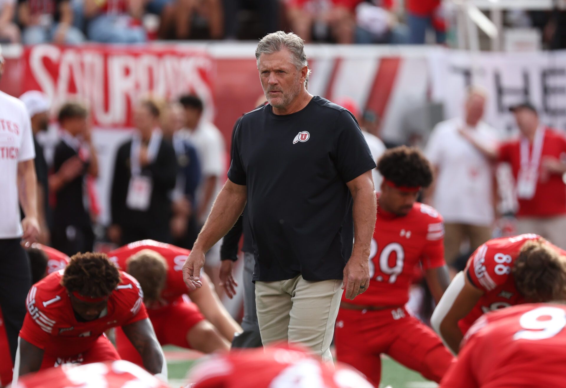 Utah Utes head coach Kyle Whittingham watches the team warm up before the game against the Texas Tech Red Raiders at Rice-Eccles Stadium.