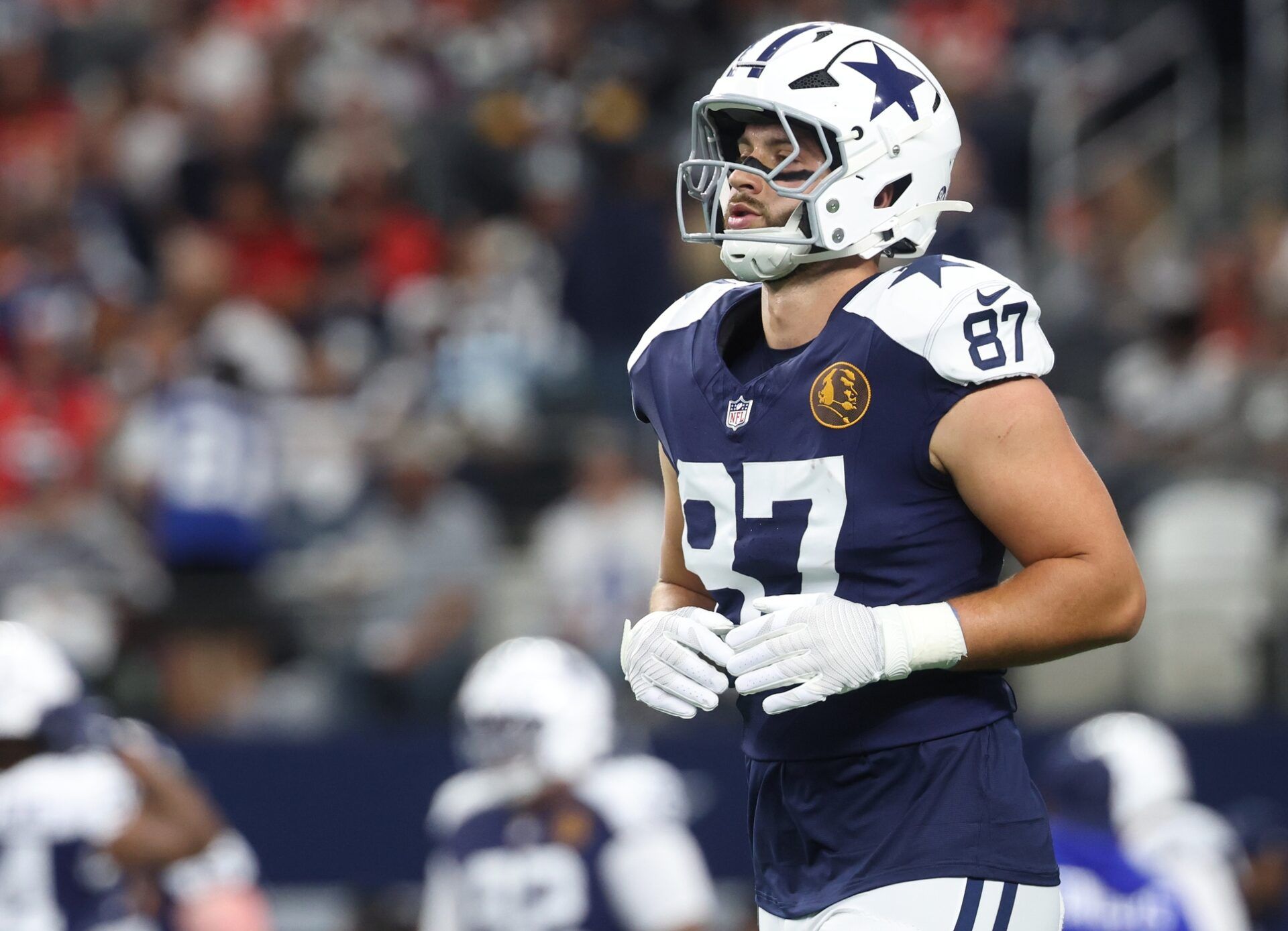 Dallas Cowboys tight end Jake Ferguson (87) warms up prior to the game against the Kansas City Chiefs at AT&T Stadium.