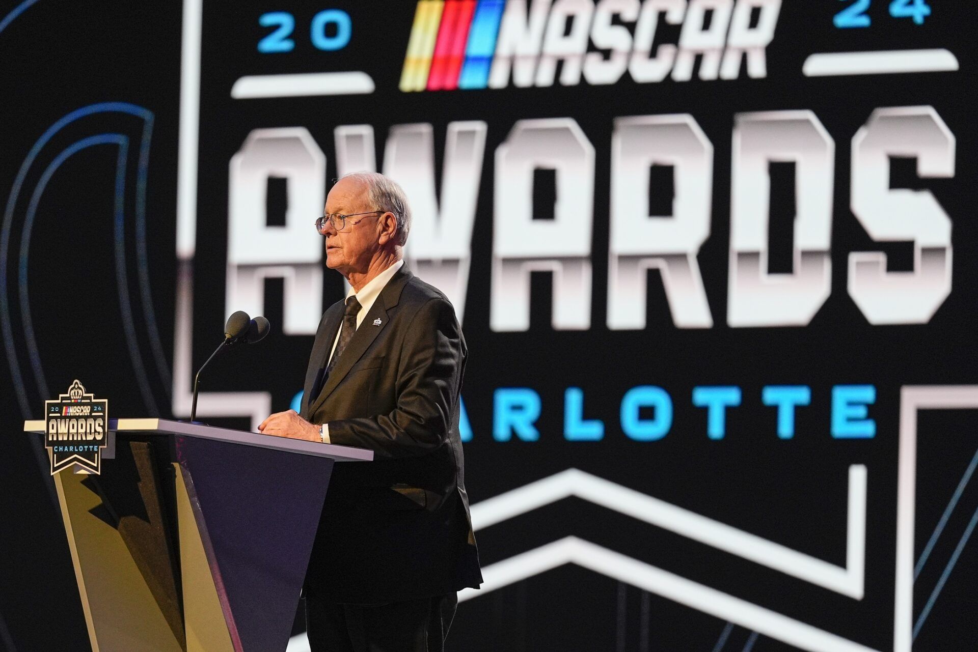 Bill France speaks to the audience during the NASCAR Awards Banquet at Charlotte Convention Center.