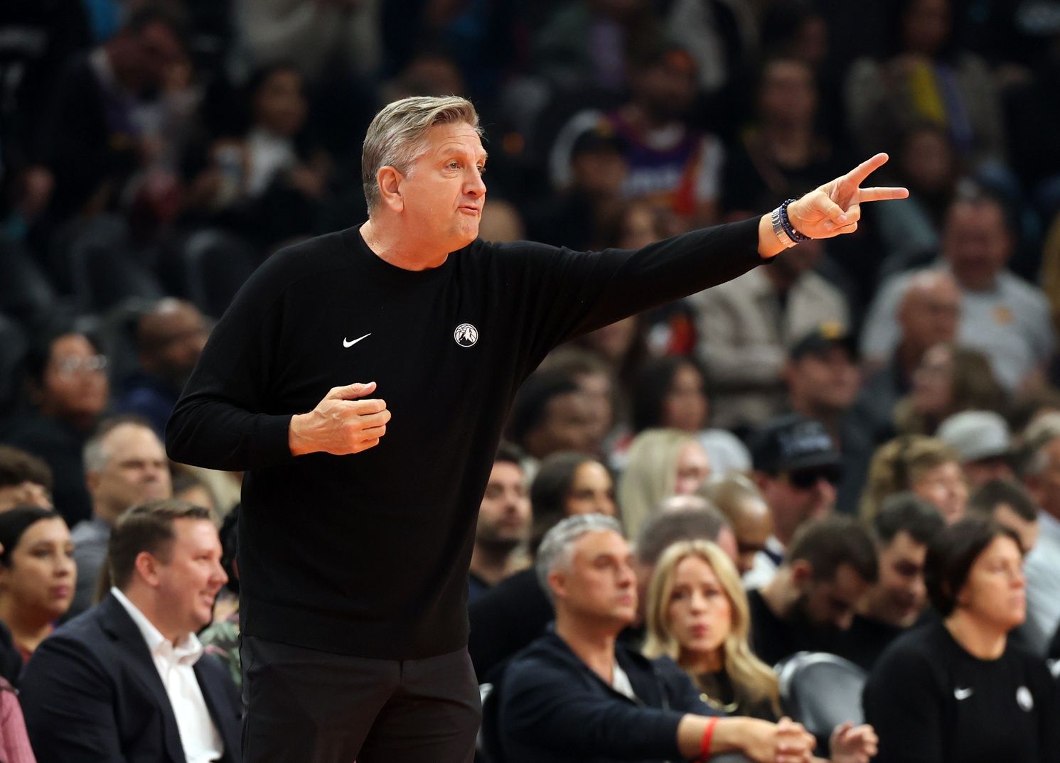 Minnesota Timberwolves head coach Chris Finch reacts against the Phoenix Suns in the first half of an NBA Cup game at Mortgage Matchup Center.