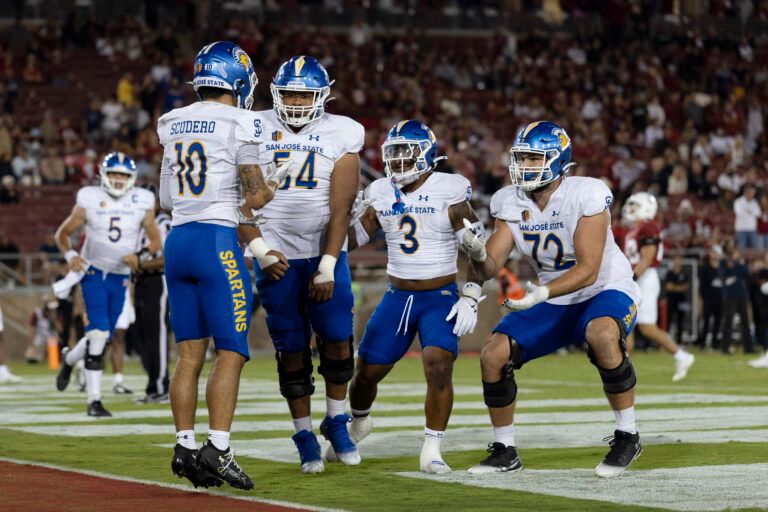 San Jose State Spartans wide receiver Danny Scudero (10) celebrates with offensive lineman Daniel Moleni (54), running back Floyd Chalk IV (3), and offensive lineman Nate Hale (72) during the fourth quarter against the Stanford Cardinal at Stanford Stadium.