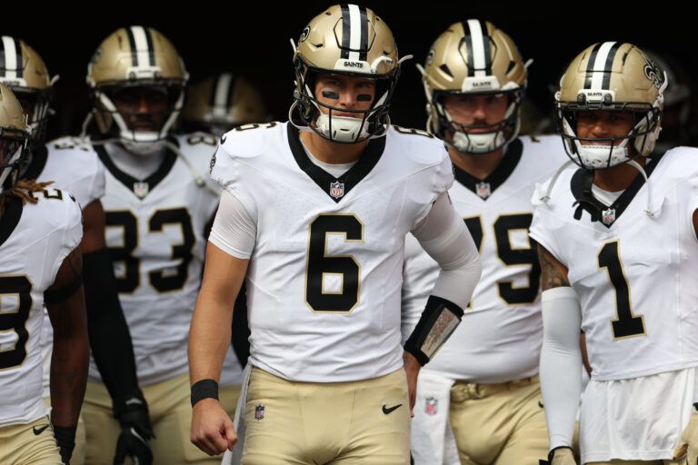 New Orleans Saints quarterback Tyler Shough (6) takes the field with teammates prior to a game against the Tampa Bay Buccaneers at Raymond James Stadium.