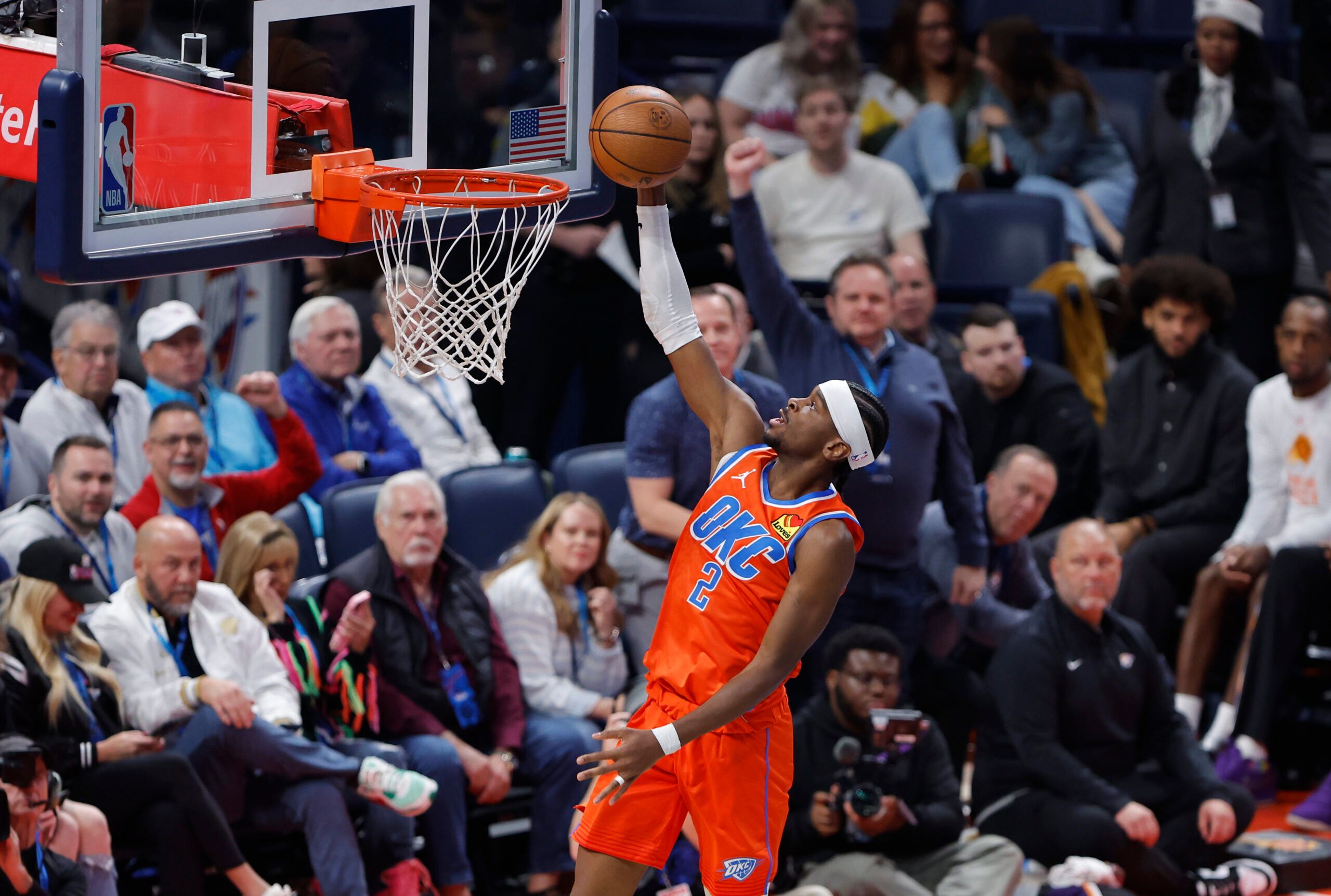 Oklahoma City Thunder guard Shai Gilgeous-Alexander (2) goes up for a basket against the Phoenix Suns during the third quarter at Paycom Center.