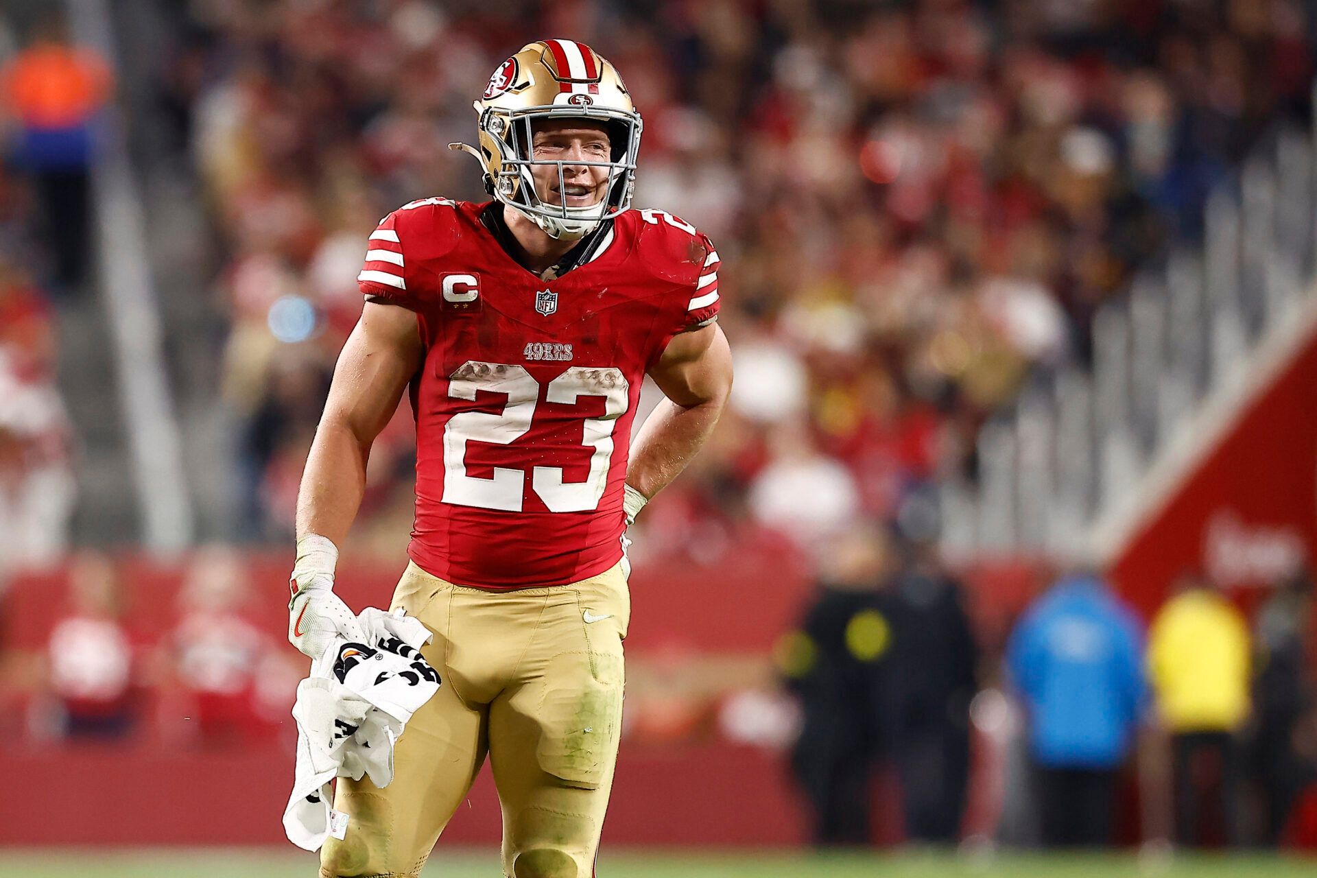 San Francisco 49ers running back Christian McCaffrey (23) reacts against the Carolina Panthers during the second half at Levi's Stadium.