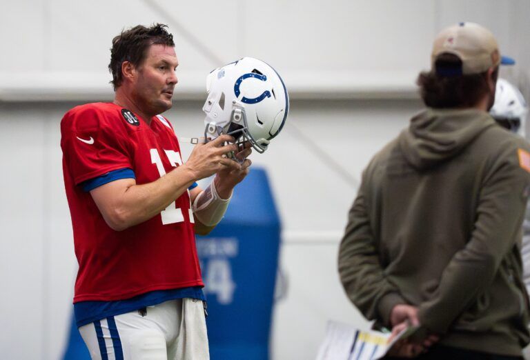 Indianapolis Colts quarterback Philip Rivers (17) puts his helmet on Wednesday, Dec. 10, 2025, during practice at the Colts training facility in Indianapolis.