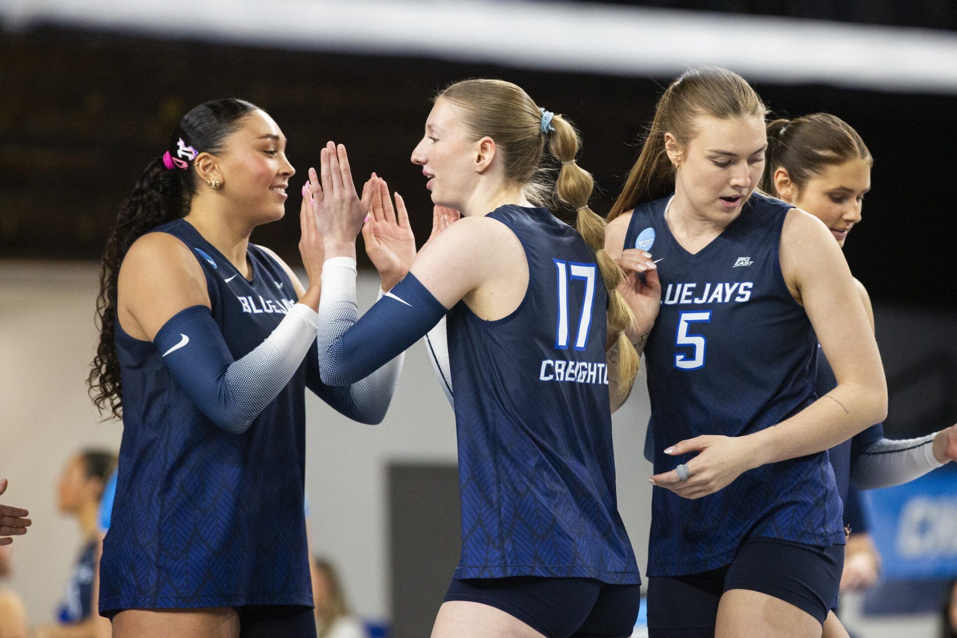 Creighton Bluejays setter Annalea Maeder (17) high-fives middle blocker Jaya Johnson (6) after a point during the first set against the Kentucky Wildcats at Historic Memorial Coliseum.