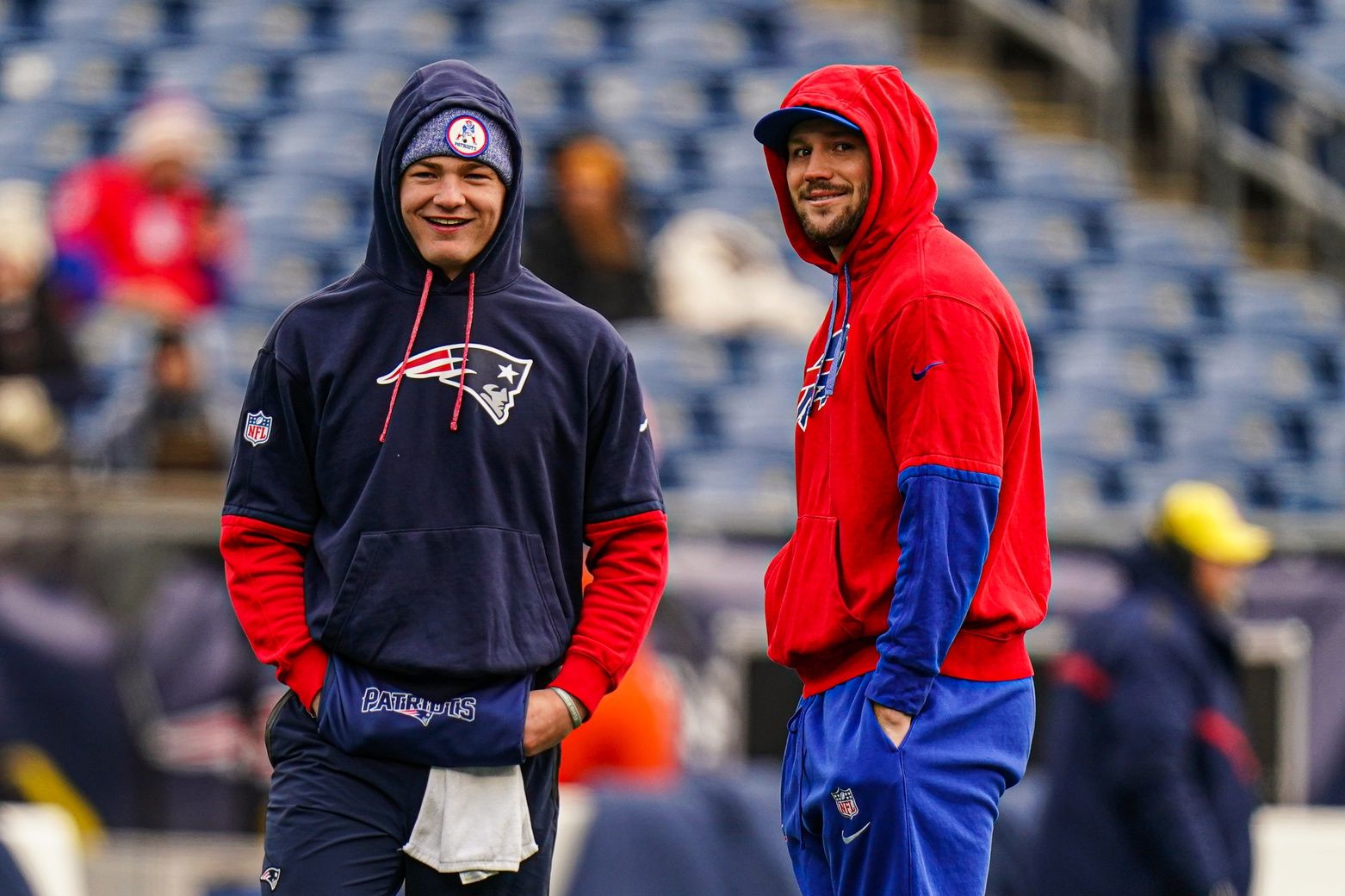 Buffalo Bills quarterback Josh Allen (17) and New England Patriots quarterback Drake Maye (10) talk on the field before the start of the game at Gillette Stadium.