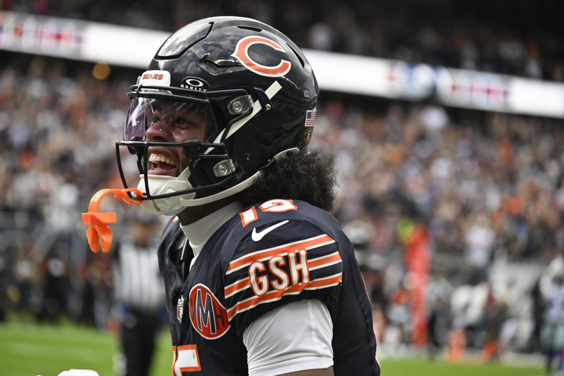 Chicago Bears Rome Odunze yells after scoring a touchdown against the Dallas Cowboys during the first half at Soldier Field.