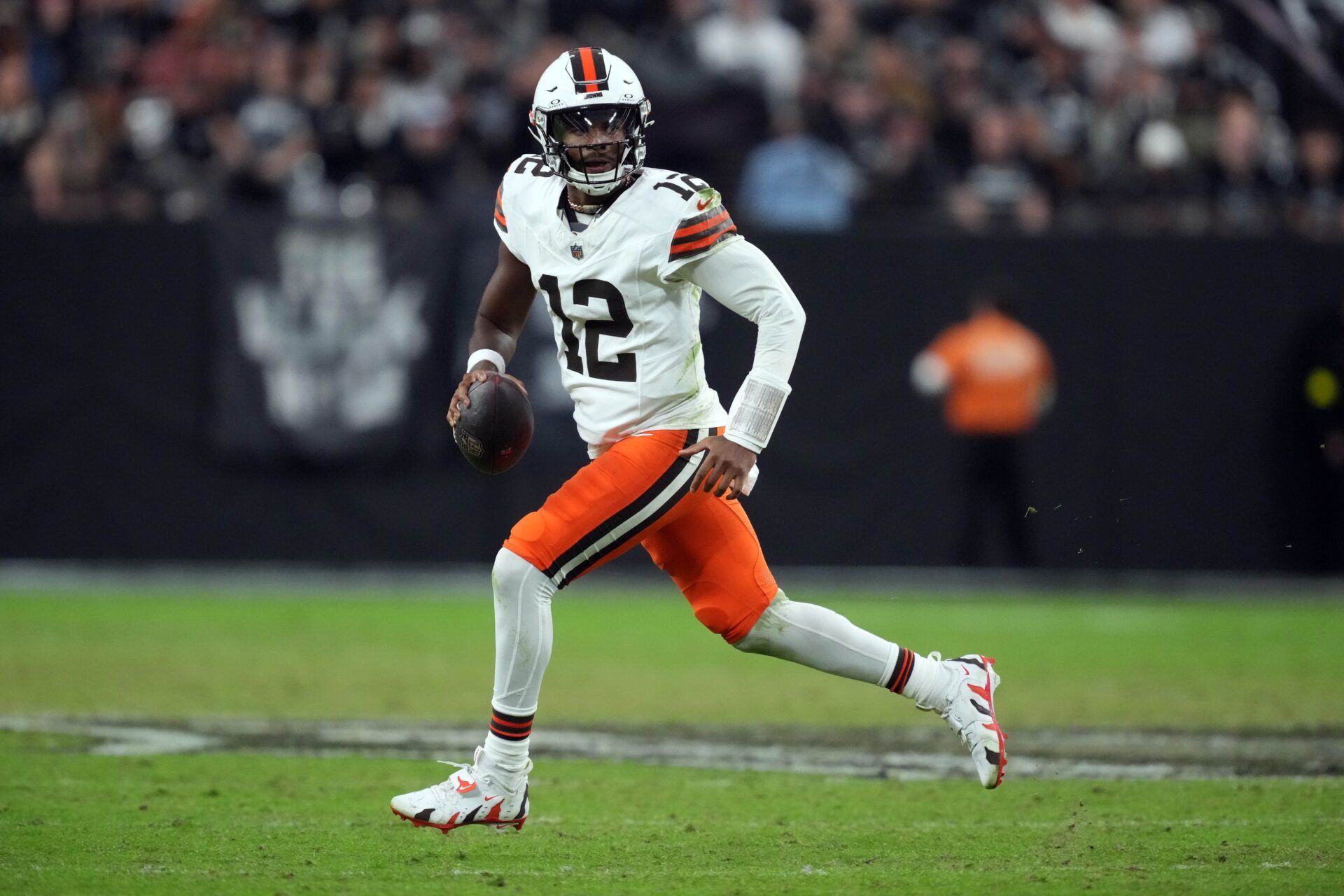 Cleveland Browns quarterback Shedeur Sanders (12) runs with the ball against the Las Vegas Raiders in the second half at Allegiant Stadium.
