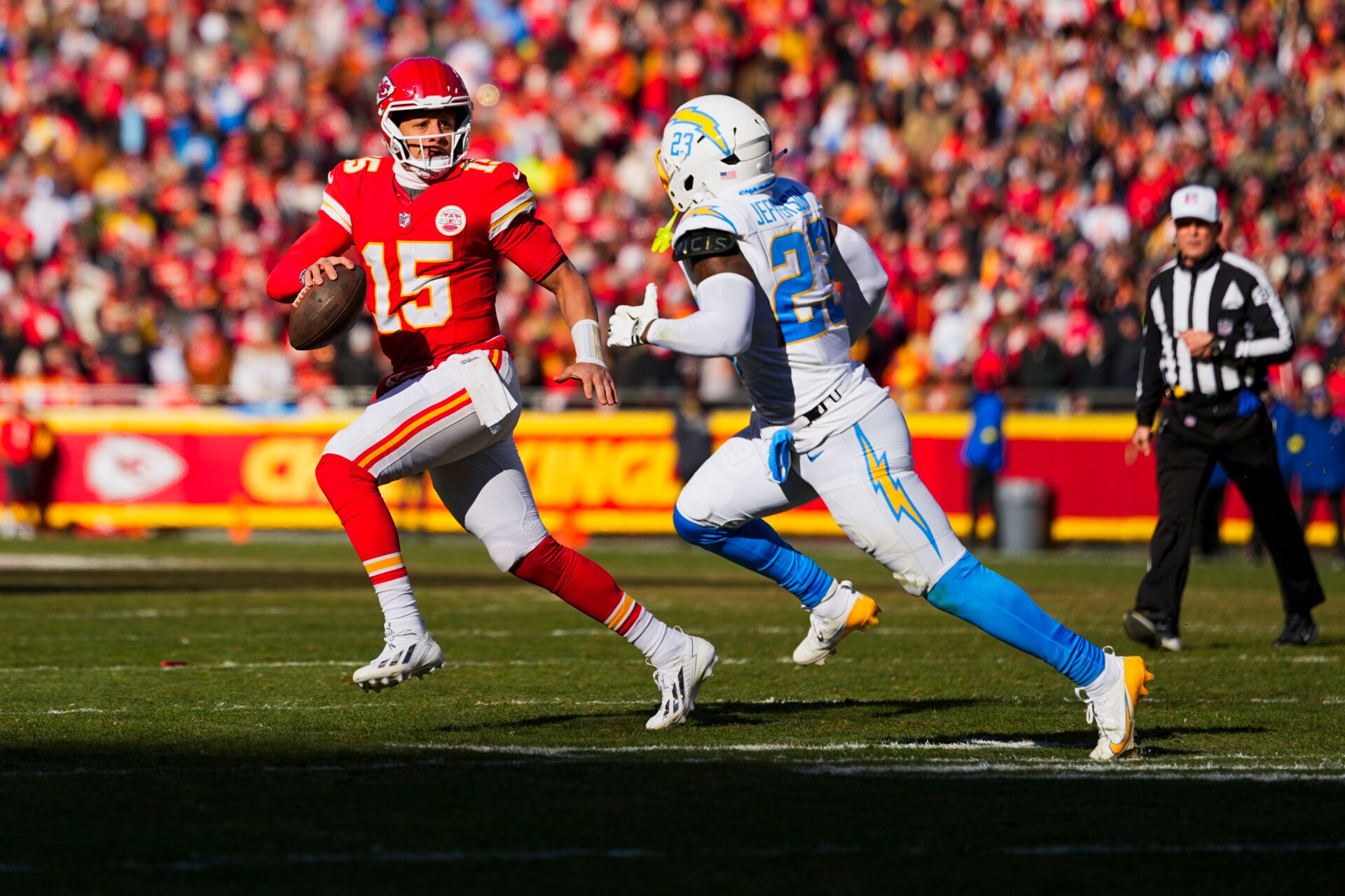 Kansas City Chiefs quarterback Patrick Mahomes (15) looks to pass against the Los Angeles Chargers during the second quarter at GEHA Field at Arrowhead Stadium.