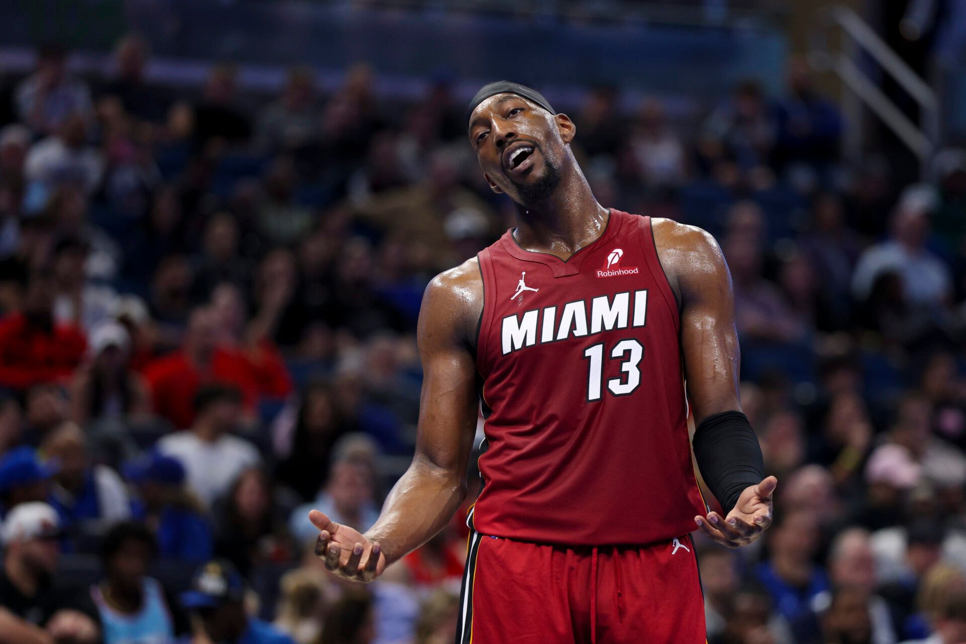 Miami Heat center Bam Adebayo (13) reacts after a call against the Orlando Magic in the fourth quarter at Kia Center.