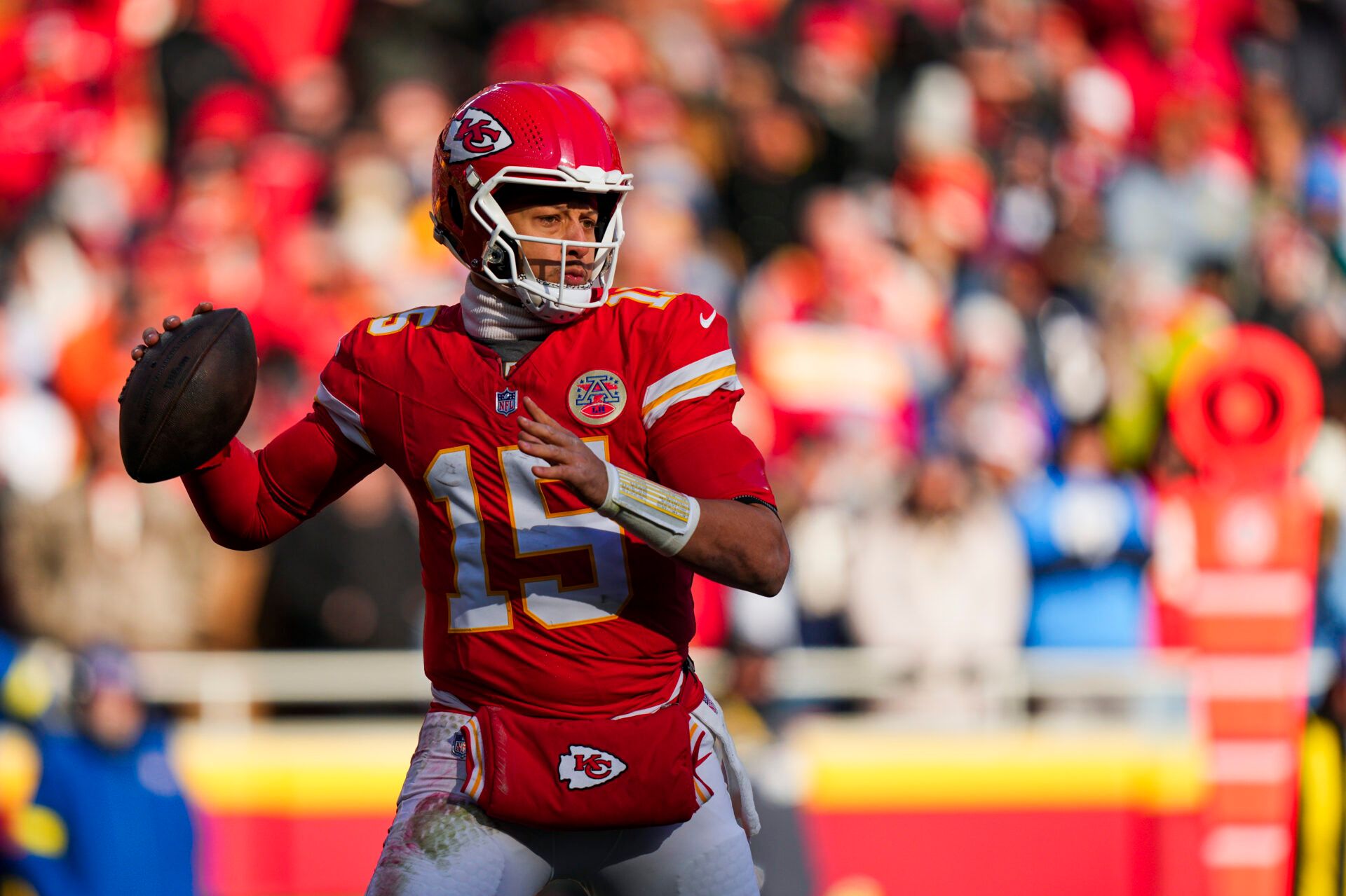 Kansas City Chiefs quarterback Patrick Mahomes (15) looks to pass against the Los Angeles Chargers during the second quarter at GEHA Field at Arrowhead Stadium.