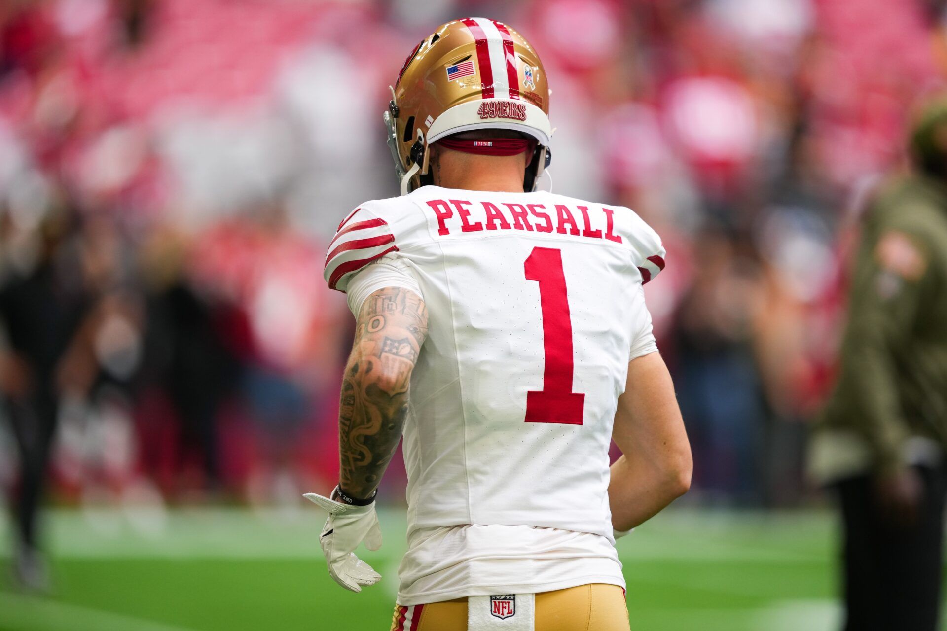 San Francisco 49ers wide receiver Ricky Pearsall (1) warms up before the game against the Arizona Cardinals at State Farm Stadium.