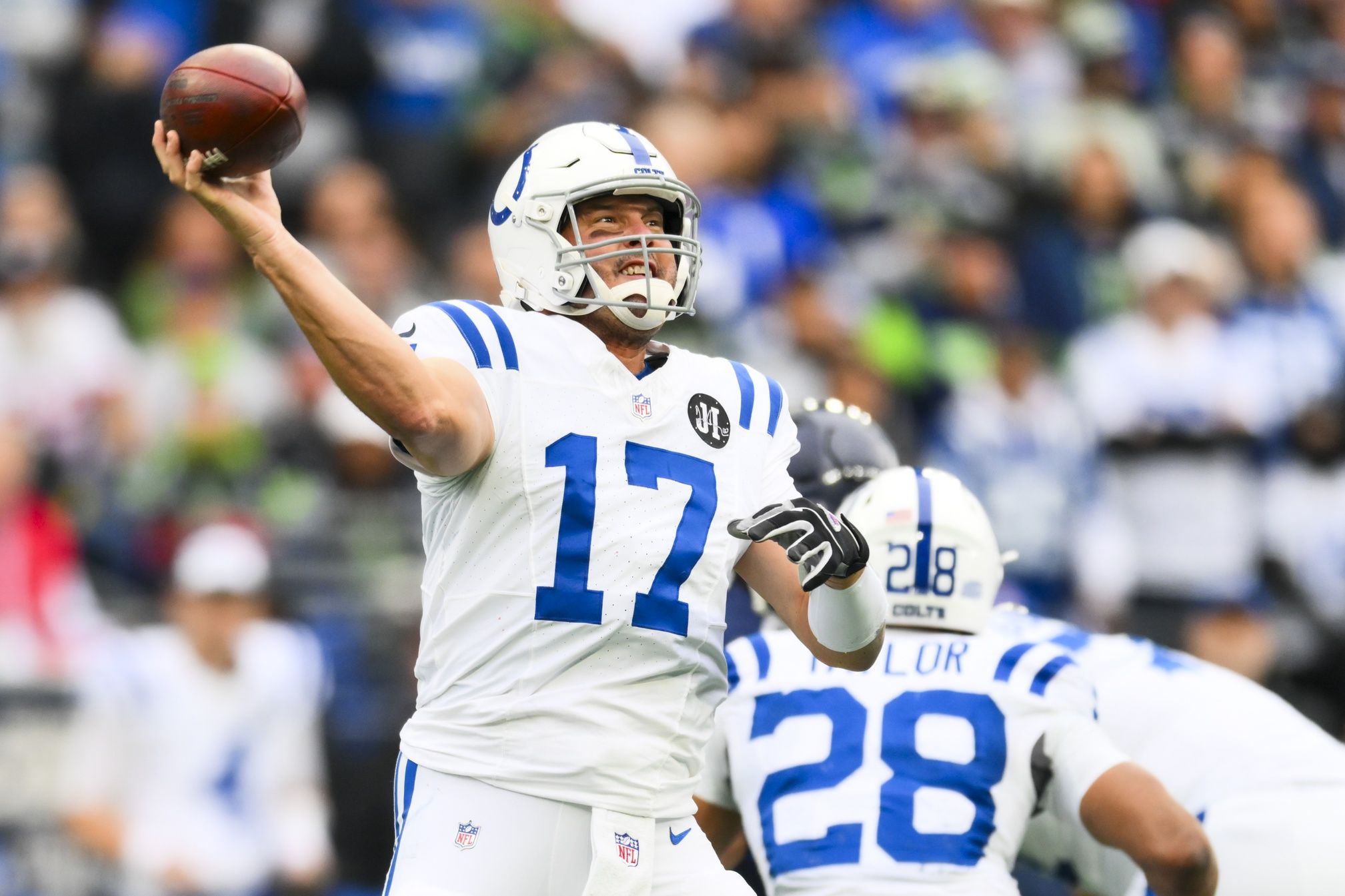 Indianapolis Colts quarterback Philip Rivers (17) passes against the Seattle Seahawks during the first quarter at Lumen Field.