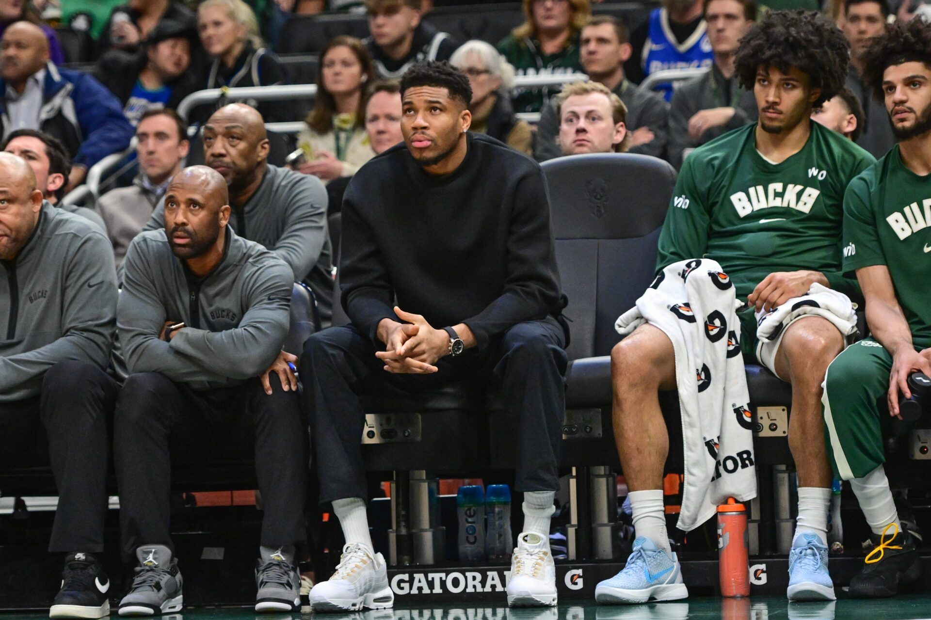 Milwaukee Bucks forward Giannis Antetokounmpo (34) watches the game against the Boston Celtics from the bench in the second quarter at Fiserv Forum.