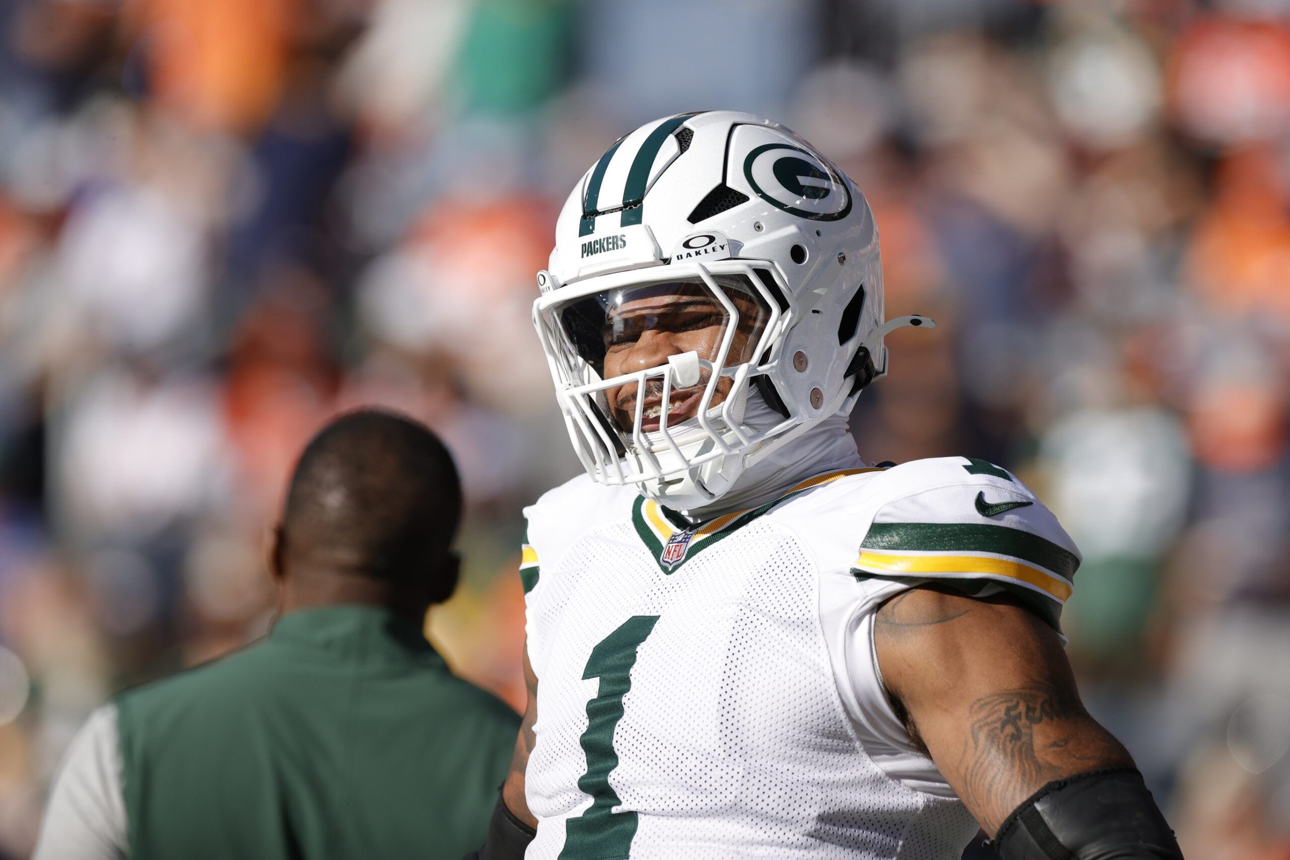Green Bay Packers defensive end Micah Parsons (1) warms up before a game against the Denver Broncos at Empower Field at Mile High.