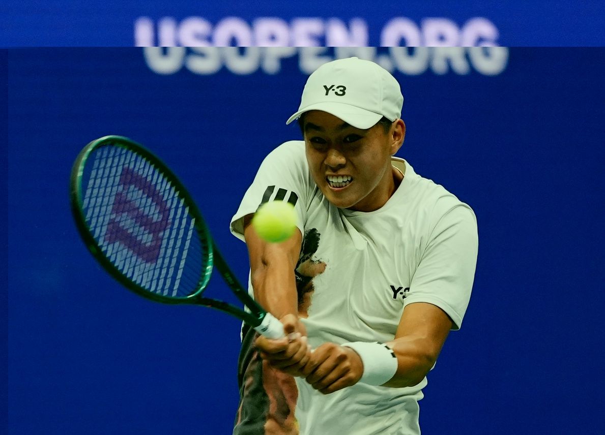 Learner Tien (USA) hits to Novak Djokovic (SRB) on day one of the 2025 U.S. Open tennis tournament at the USTA Billie Jean King National Tennis Center.