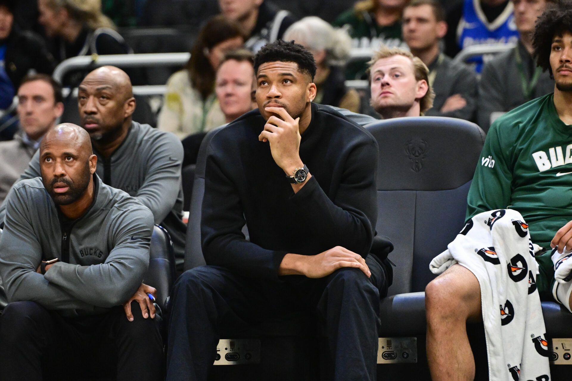Milwaukee Bucks forward Giannis Antetokounmpo (34) looks on from the bench while recovering from an injury in the second quarter against the Boston Celtics at Fiserv Forum.