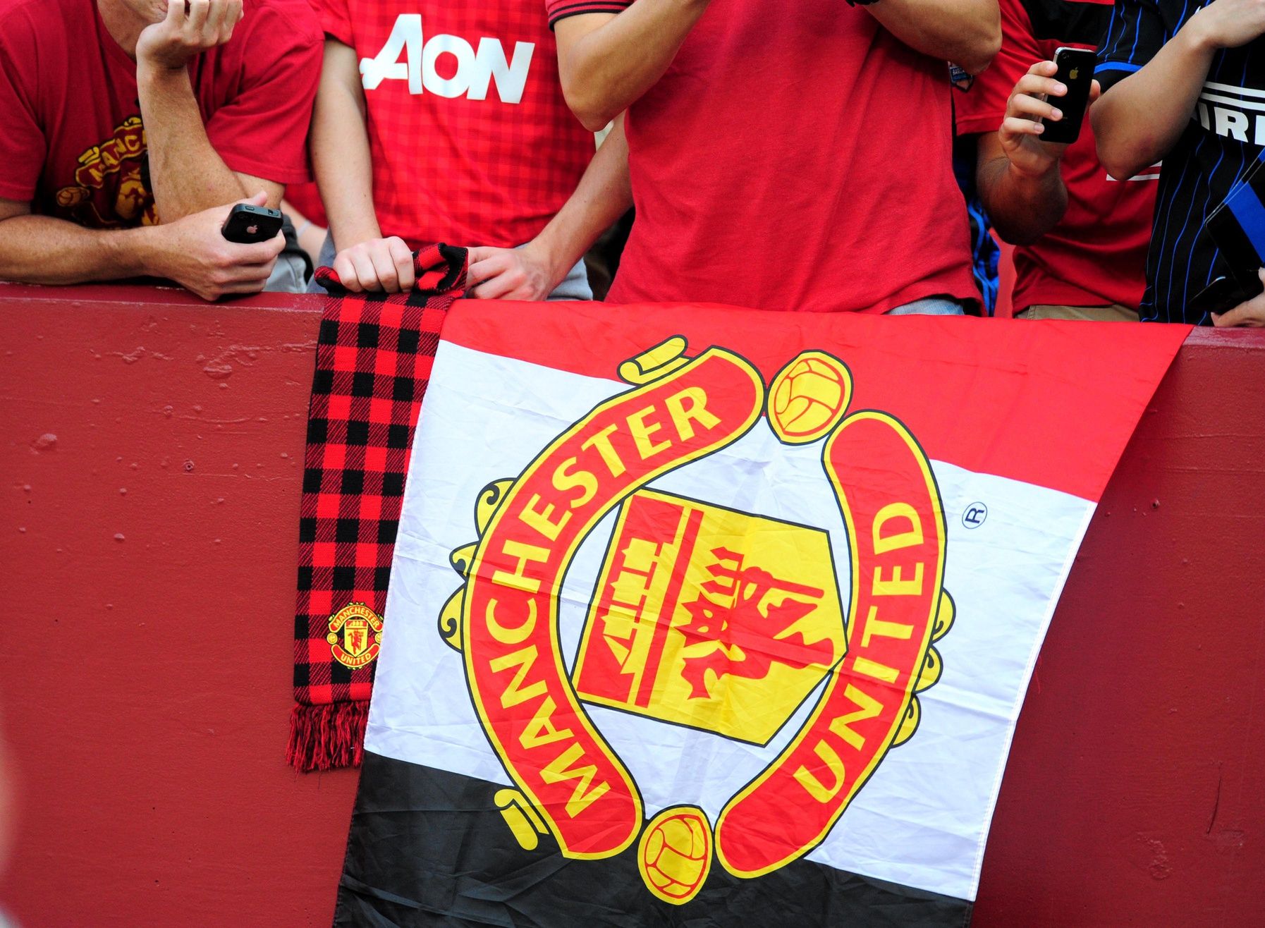 Fans hang a flag prior to the match between Inter Milan and Manchester United at FedEx Field.