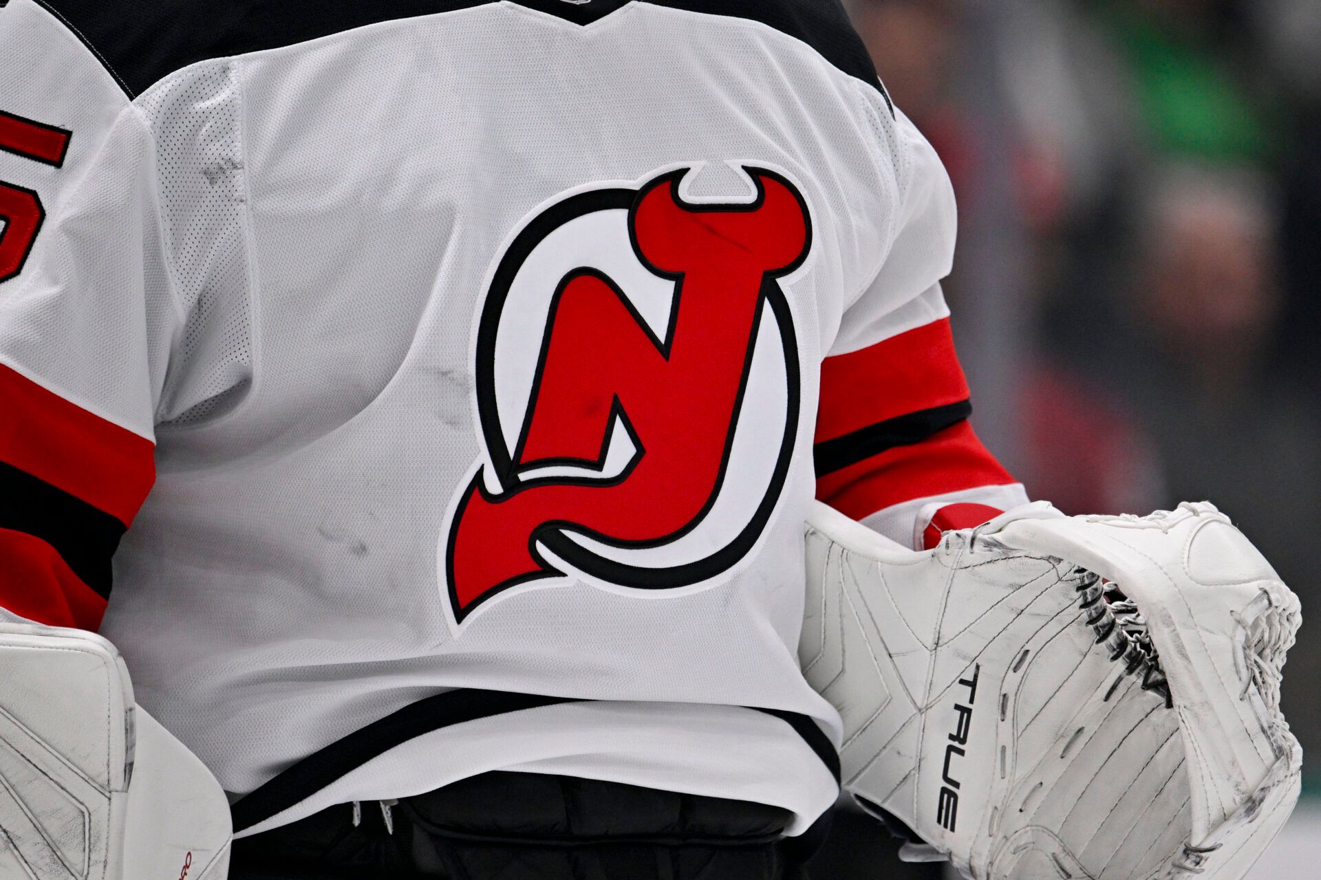 A view of the logo on the jersey of New Jersey Devils goaltender Jacob Markstrom (25) during the game between the Dallas Stars and the New Jersey Devils at the American Airlines Center.