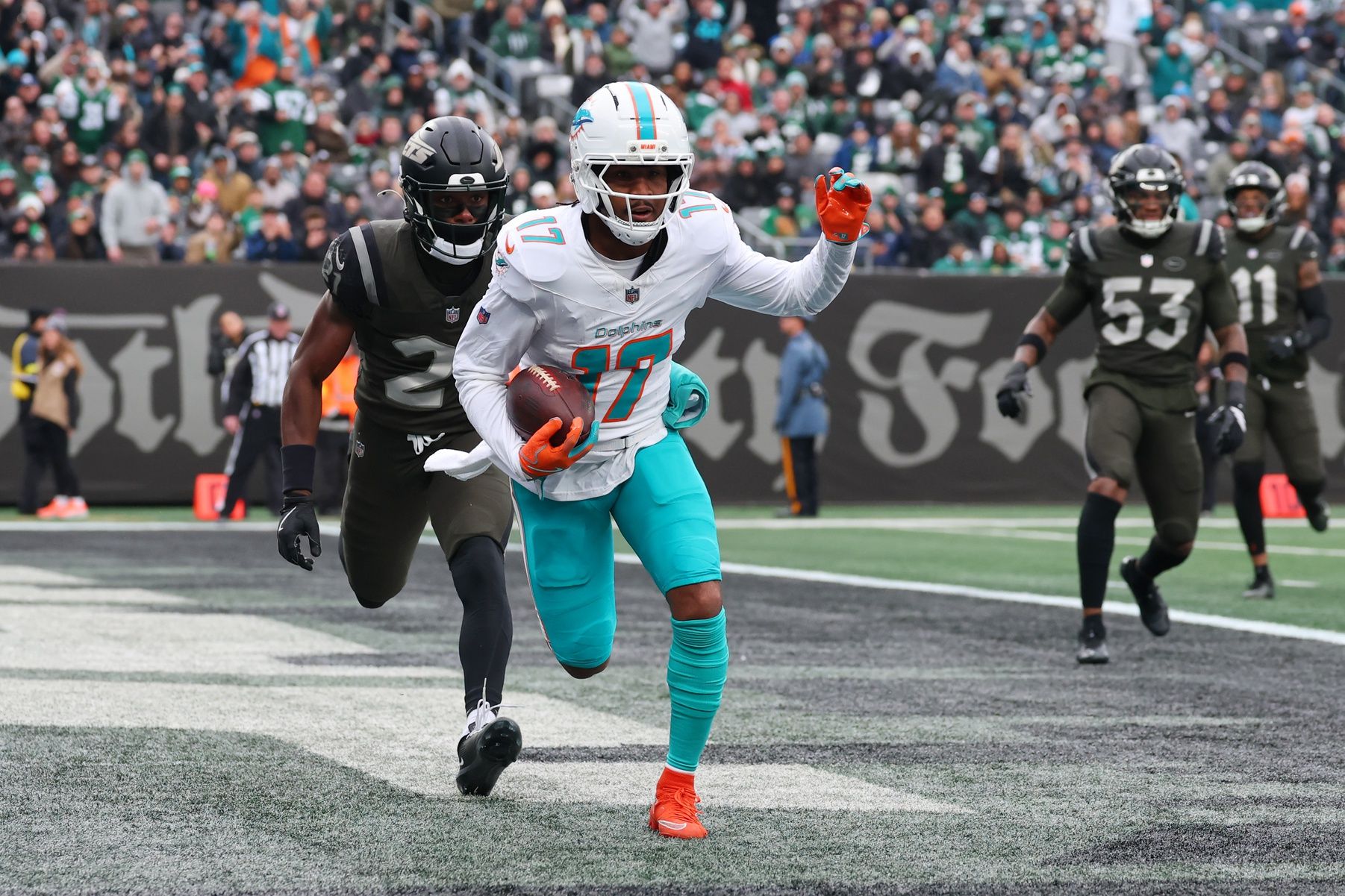 Miami Dolphins wide receiver Jaylen Waddle (17) reacts after making a catch for a touchdown against the New York Jets during the first half at MetLife Stadium.