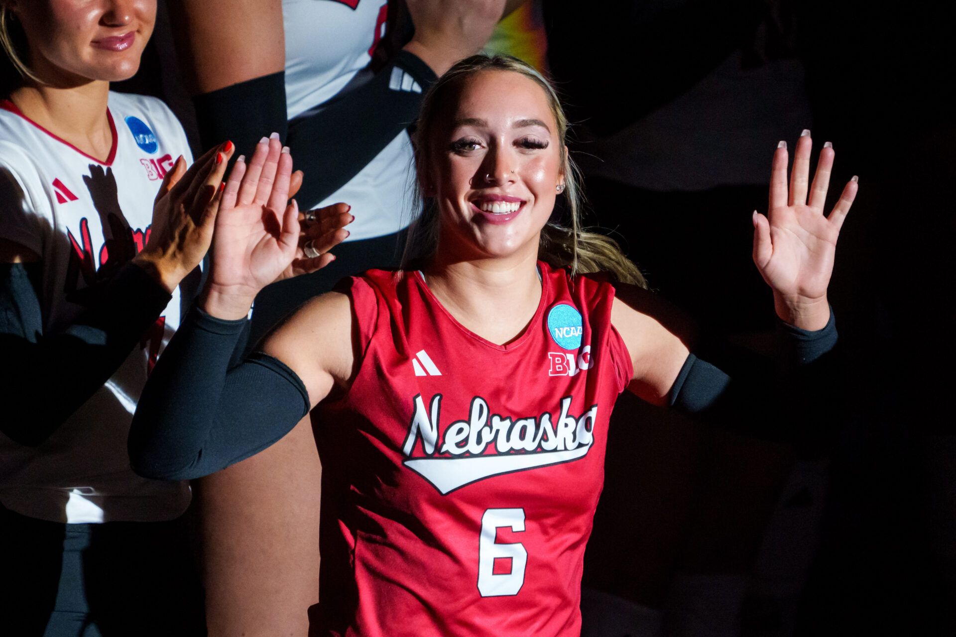 Nebraska Cornhuskers libero Laney Choboy (6) waves during introductions before the match against the Kansas Jayhawks at Bob Devaney Sports Center.
