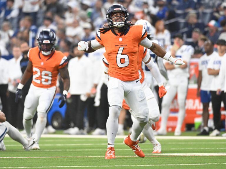 Denver Broncos safety P.J. Locke (6) reacts during the second quarter against the Indianapolis Colts at Lucas Oil Stadium.