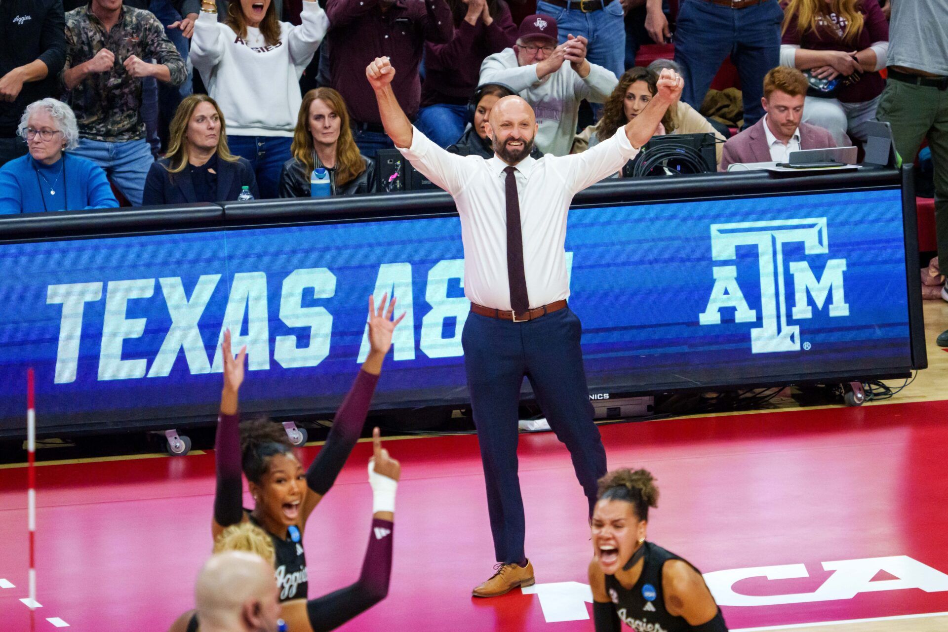 Texas A&M Aggies head coach Jamie Morrison reacts after a point against the Nebraska Cornhuskers during the first set at Bob Devaney Sports Center.