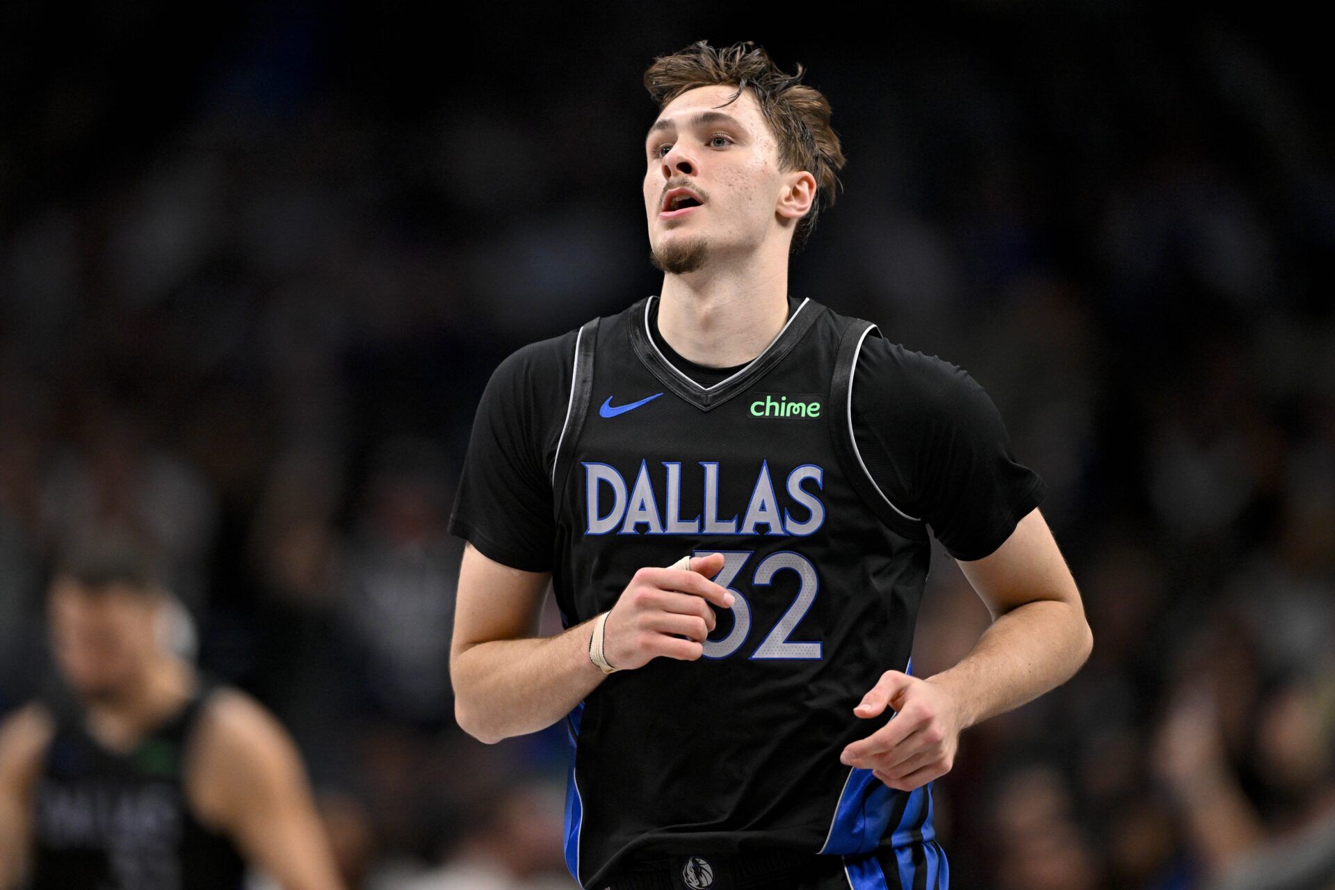 Dallas Mavericks forward Cooper Flagg (32) runs back up the court during the game between the Mavericks and the Grizzlies at American Airlines Center.