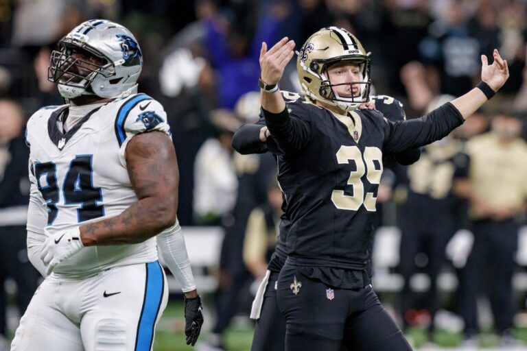 New Orleans Saints kicker Charlie Smyth (39) celebrates after a field goal to win the game against the Carolina Panthers at Caesars Superdome.