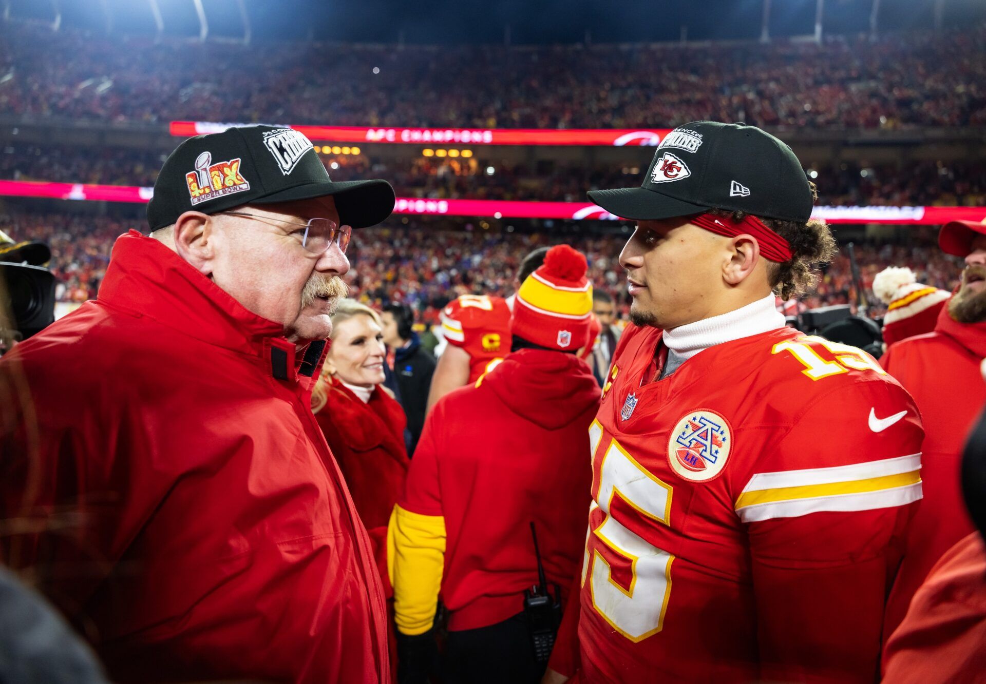 Kansas City Chiefs head coach Andy Reid (left) with quarterback Patrick Mahomes (15) after defeating the Buffalo Bills in the AFC Championship game at GEHA Field at Arrowhead Stadium.
