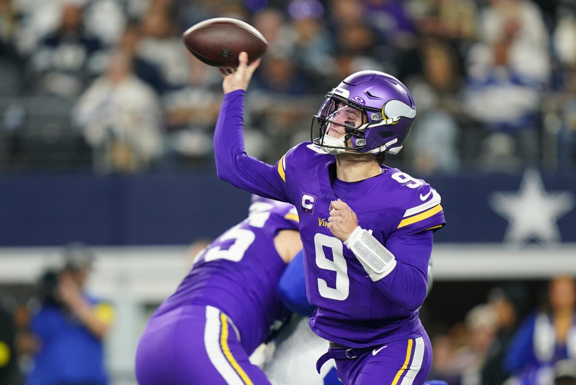 Minnesota Vikings quarterback J.J. McCarthy (9) throws during the second half against the Dallas Cowboys at AT&T Stadium.
