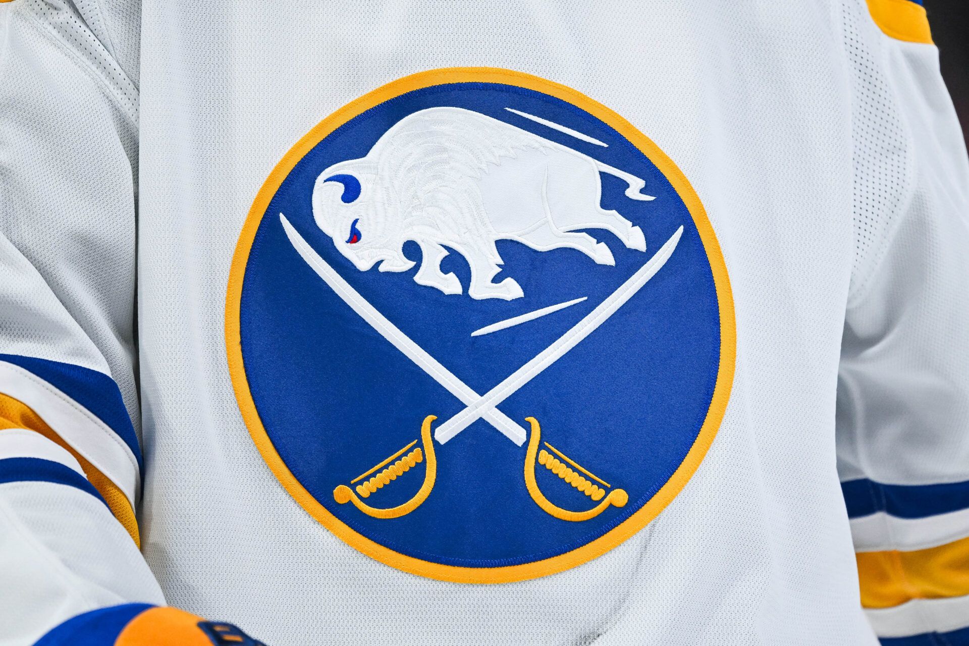 View of a Buffalo Sabres logo on a jersey worn by a member of the team during the second period at Bell Centre.