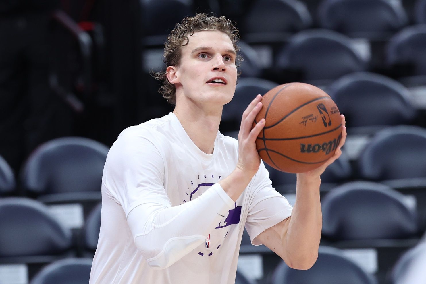 Utah Jazz forward Lauri Markkanen (23) warms up before the game against the Dallas Mavericks at Delta Center.