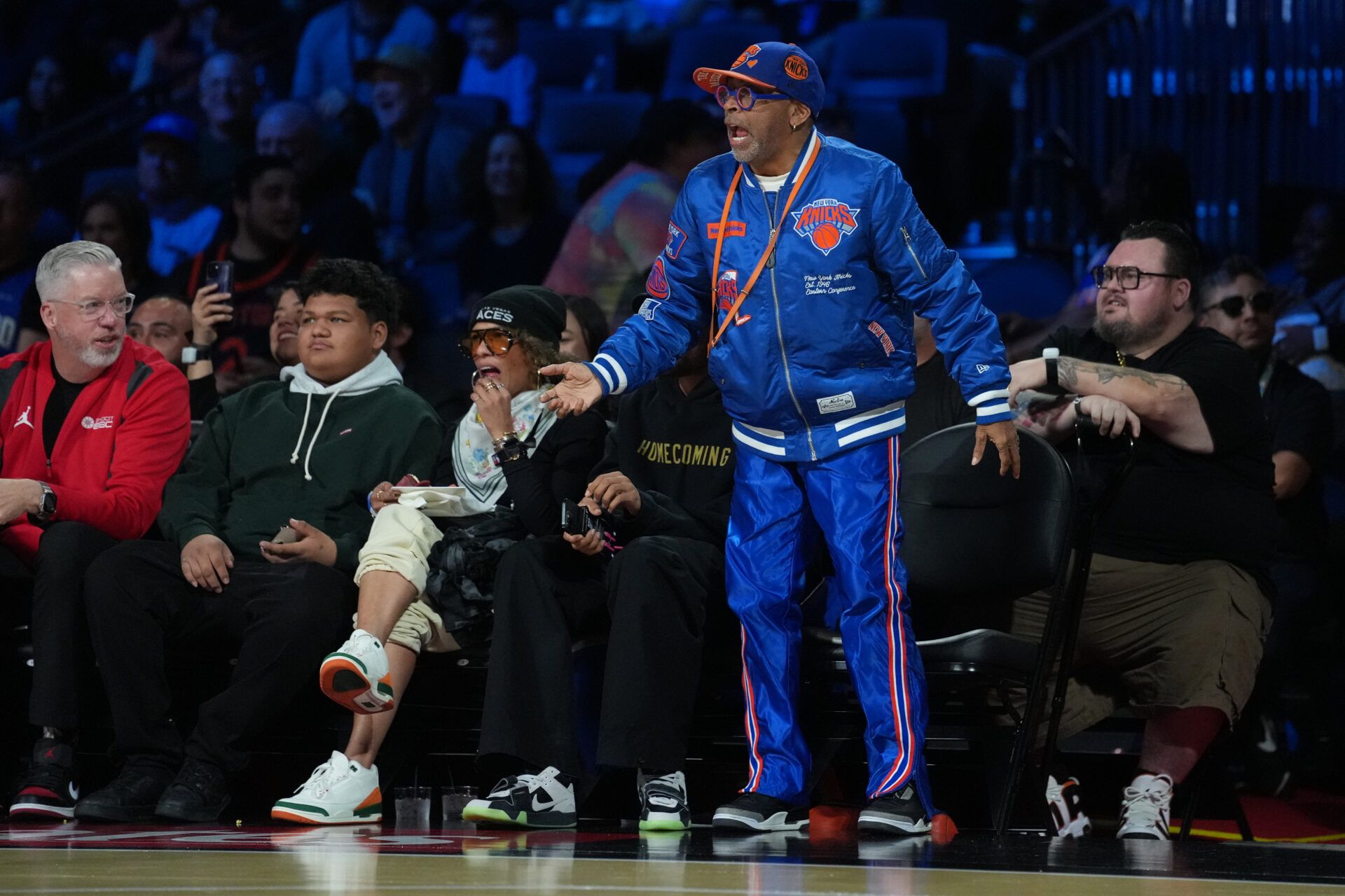 New York Knicks fan Spike Lee reacts in the stands during the third quarter of a game between the New York Knicks and the Orlando Magic at T-Mobile Arena.