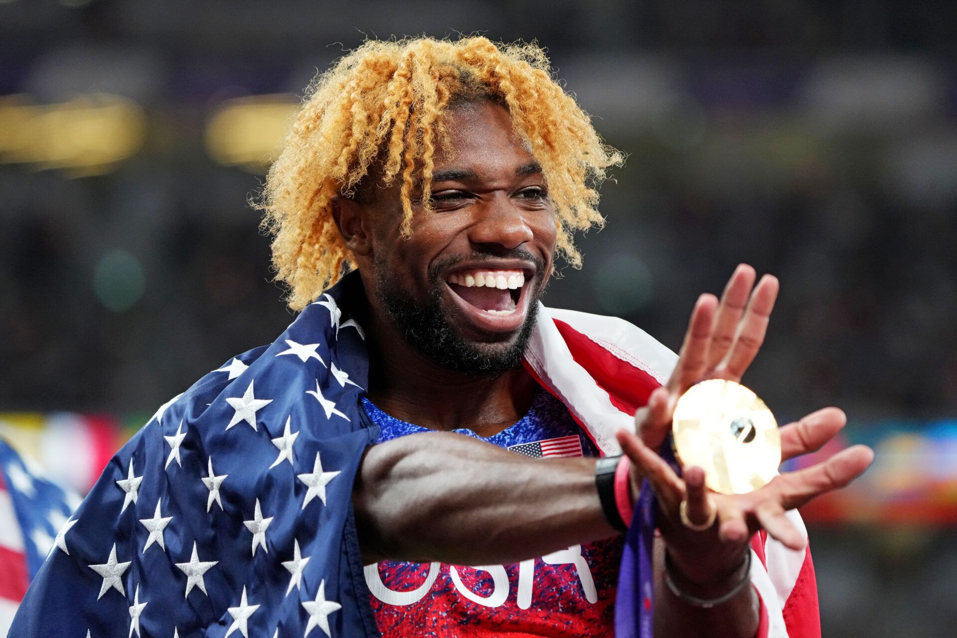 Noah Lyles (USA) celebrates winning the gold medal in the mens 200m during the World Athletics Championships at National Stadium.