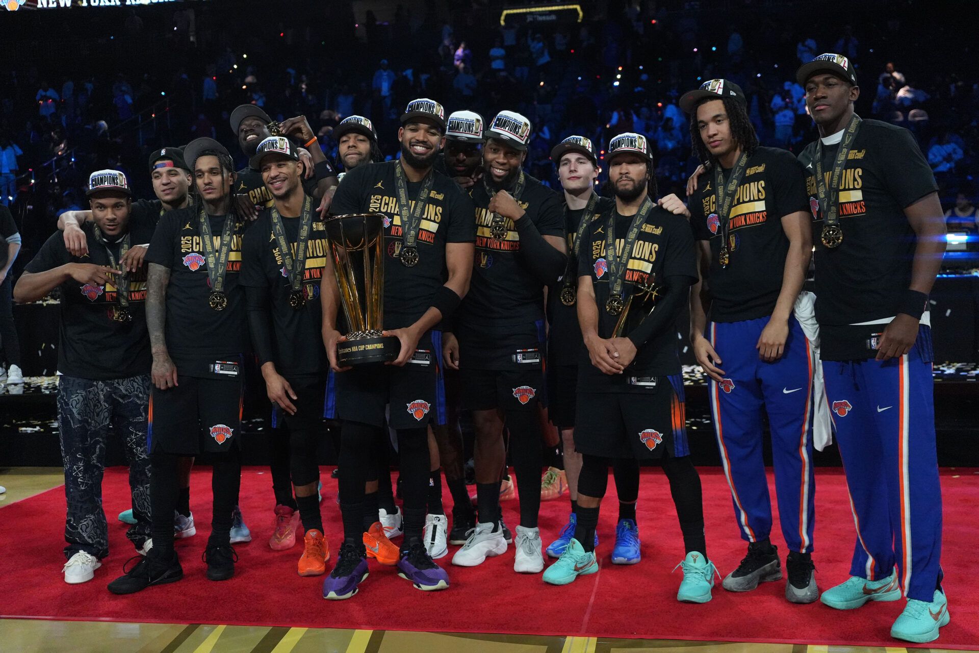 The New York Knicks pose for a photograph after winning the Emirates NBA Cup Final at T-Mobile Arena.