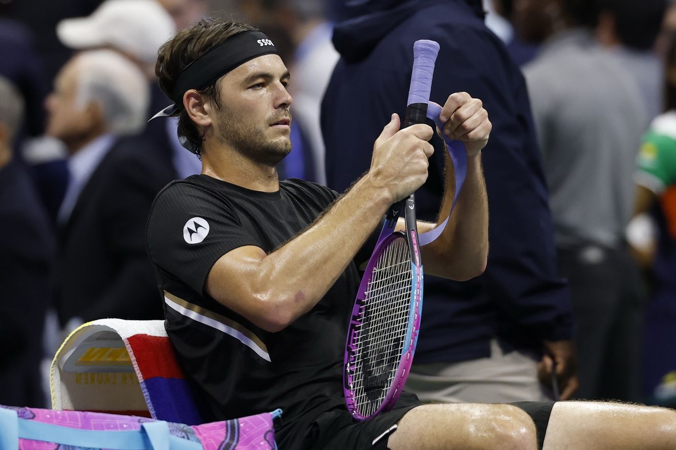 Taylor Fritz (USA) wraps a new grip on his racquet at the ned of the first set against Novak Djokovic (SRB) (not pictured) on day ten of the 2025 US Open tennis championships at Billie Jean King National Tennis Center.