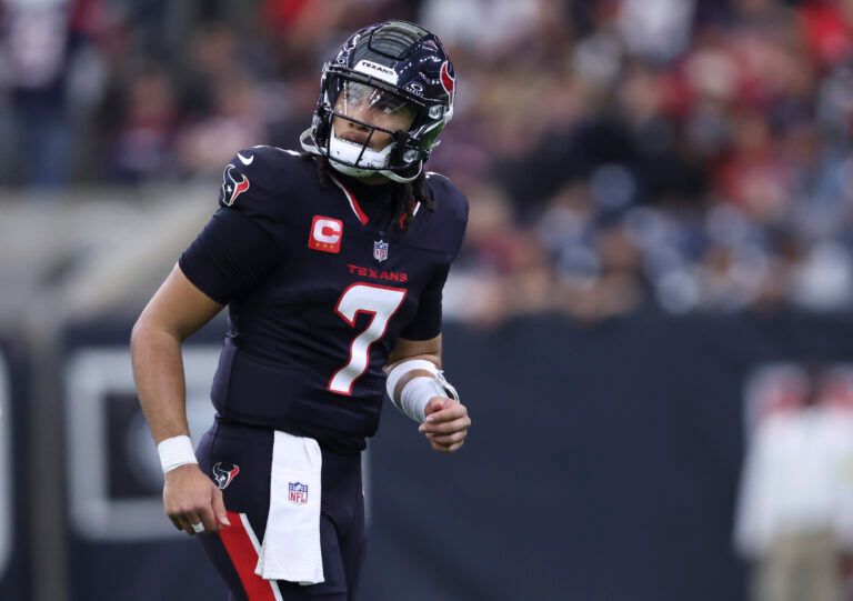 Houston Texans quarterback C.J. Stroud (7) jogs off the field after a play during the game against the Arizona Cardinals at NRG Stadium.