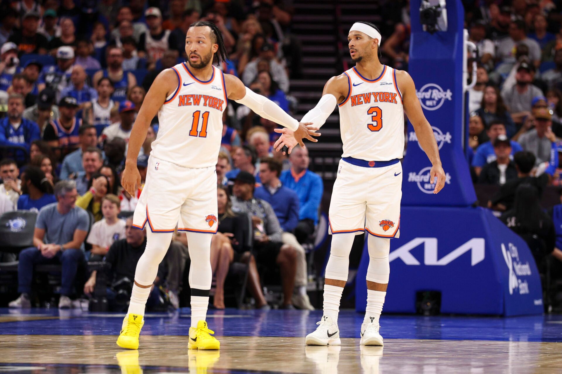 New York Knicks guard Jalen Brunson (11) and guard Josh Hart (3) react after a play against the Orlando Magic in the second quarter at Kia Center.