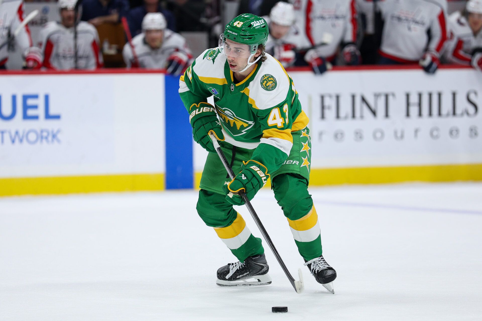 Minnesota Wild defenseman Quinn Hughes (43) skates with the puck during the first period against the Washington Capitals at Grand Casino Arena.