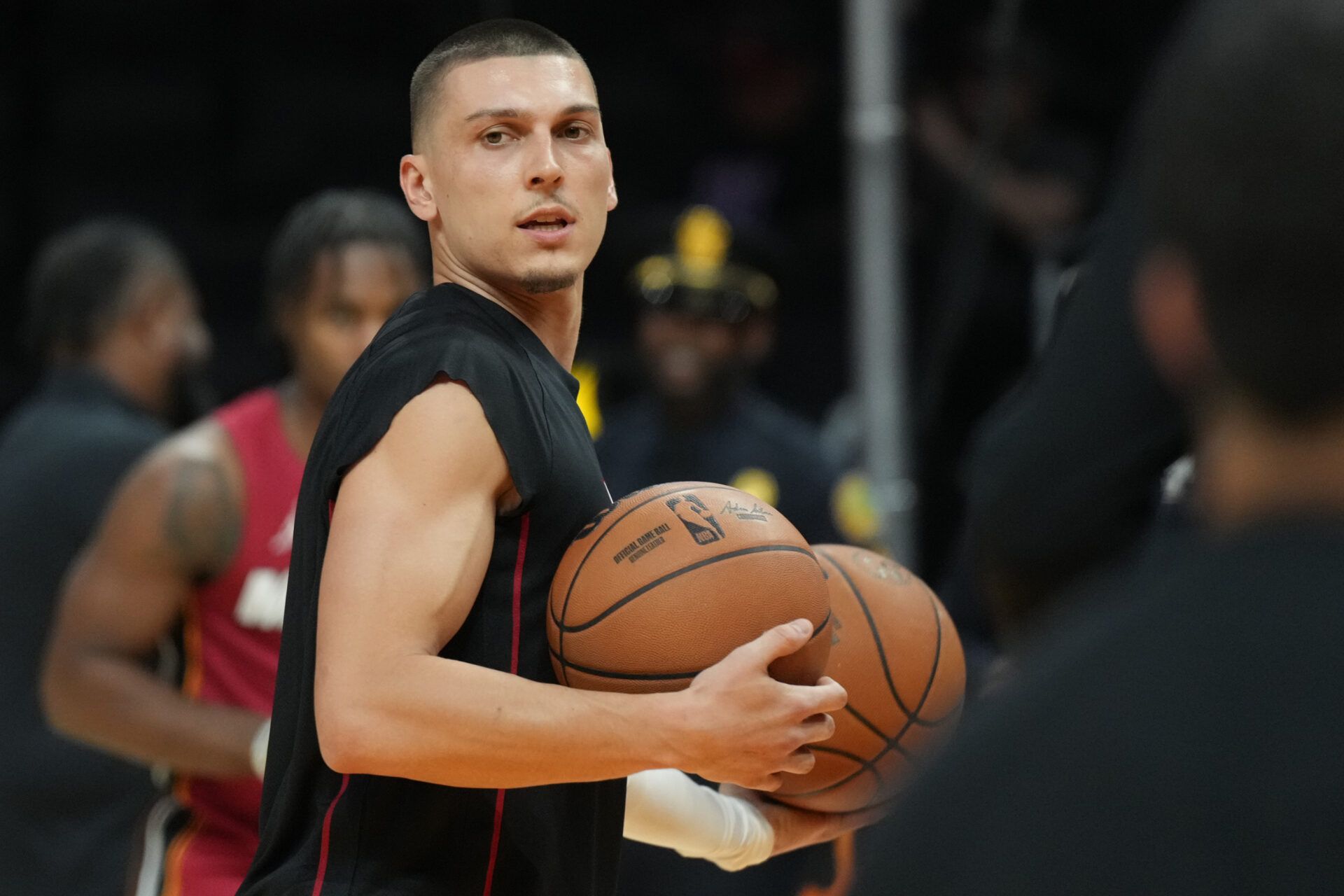 Miami Heat guard Tyler Herro (14) warms-up before the game against the Dallas Mavericks at Kaseya Center.