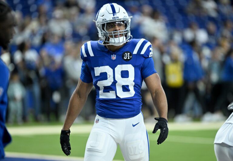 Indianapolis Colts running back Jonathan Taylor (28) warms up before a game against the Houston Texans at Lucas Oil Stadium.