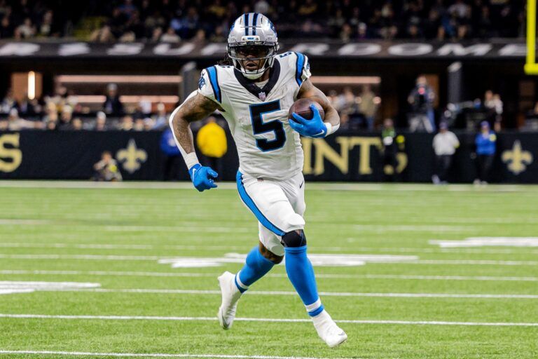 Carolina Panthers running back Rico Dowdle (5) runs with the ball against the New Orleans Saints during the second quarter at Caesars Superdome.