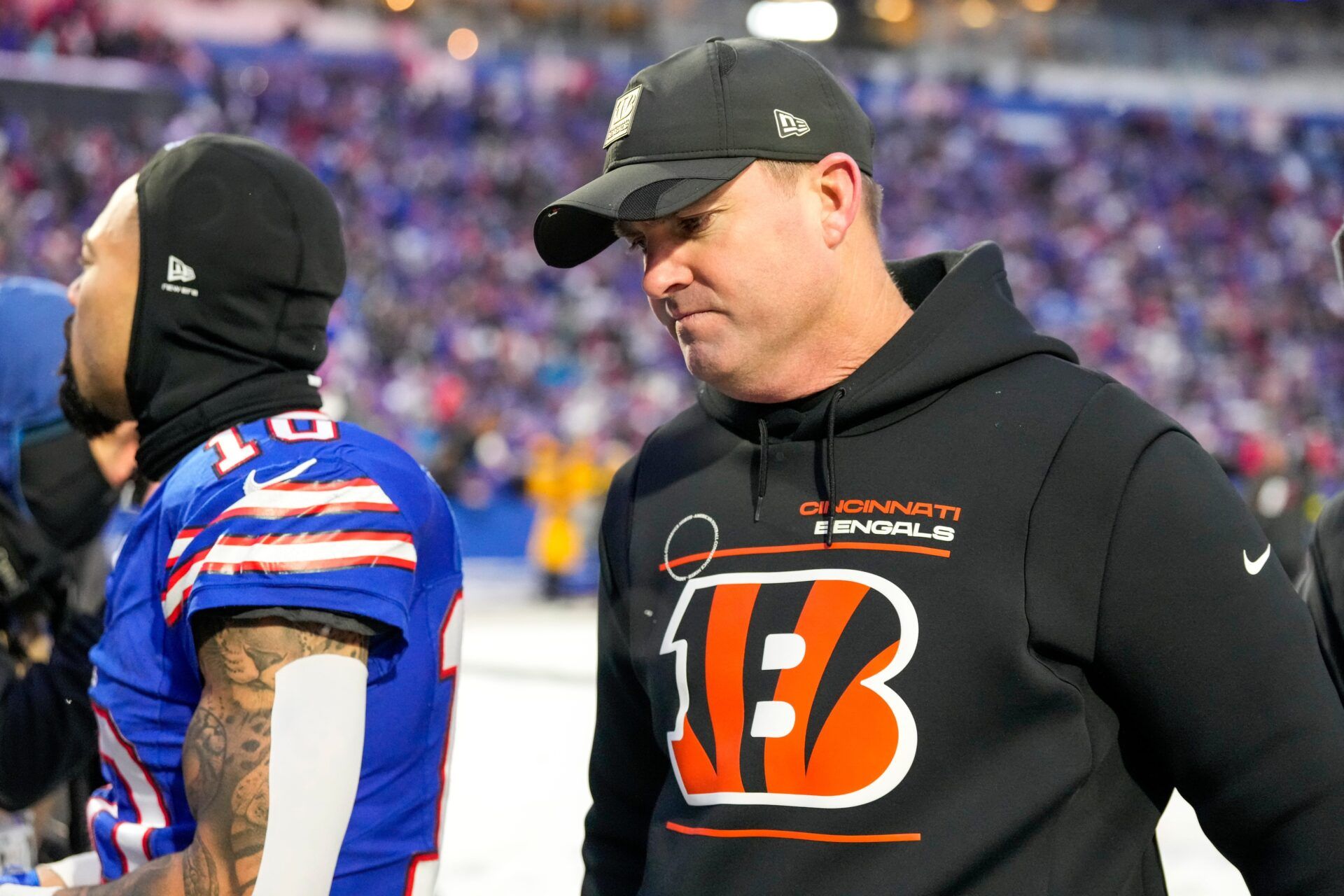 Cincinnati Bengals head coach Zac Taylor heads for the locker room after the fourth quarter of the NFL Week 14 game between the Buffalo Bills and the Cincinnati Bengals at Highmark Stadium in Orchard Park, N.Y., on Sunday, Dec. 7, 2025. The Bills overcame a halftime deficit to win 39-34.