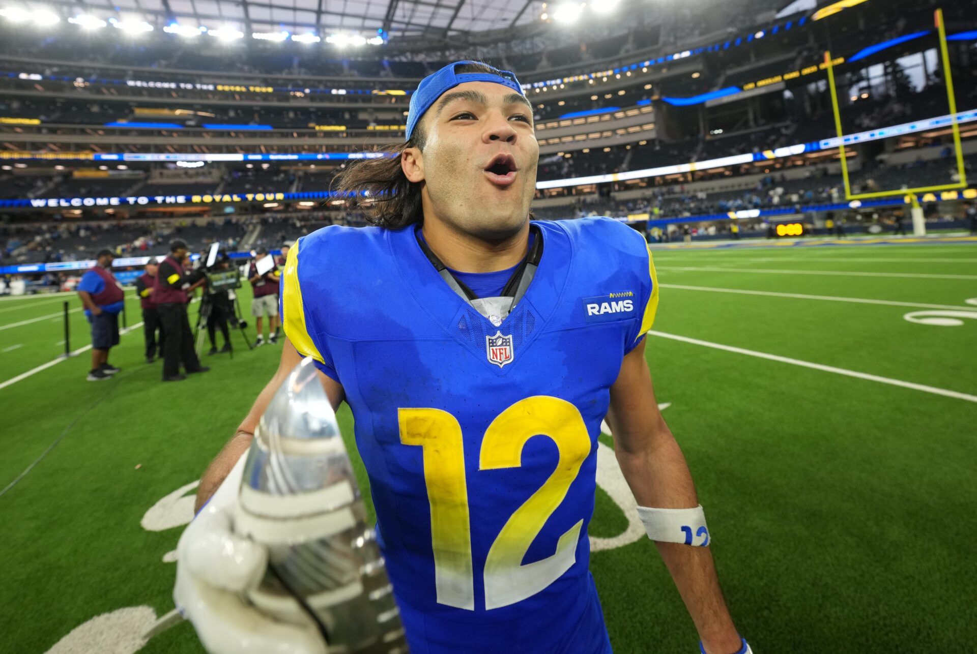 Los Angeles Rams wide receiver Puka Nacua (12) celebrates after defeating the Detroit Lions at SoFi Stadium.