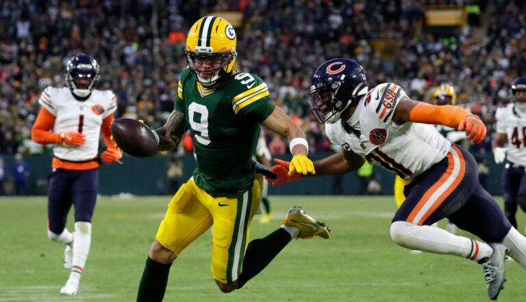Green Bay Packers wide receiver Christian Watson (9) runs the ball in for a touchdown during a football game against the Chicago Bears on Dec. 7, 2025, at Lambeau Field in Green Bay, Wis. The Packers defeated the Bears 28-21.