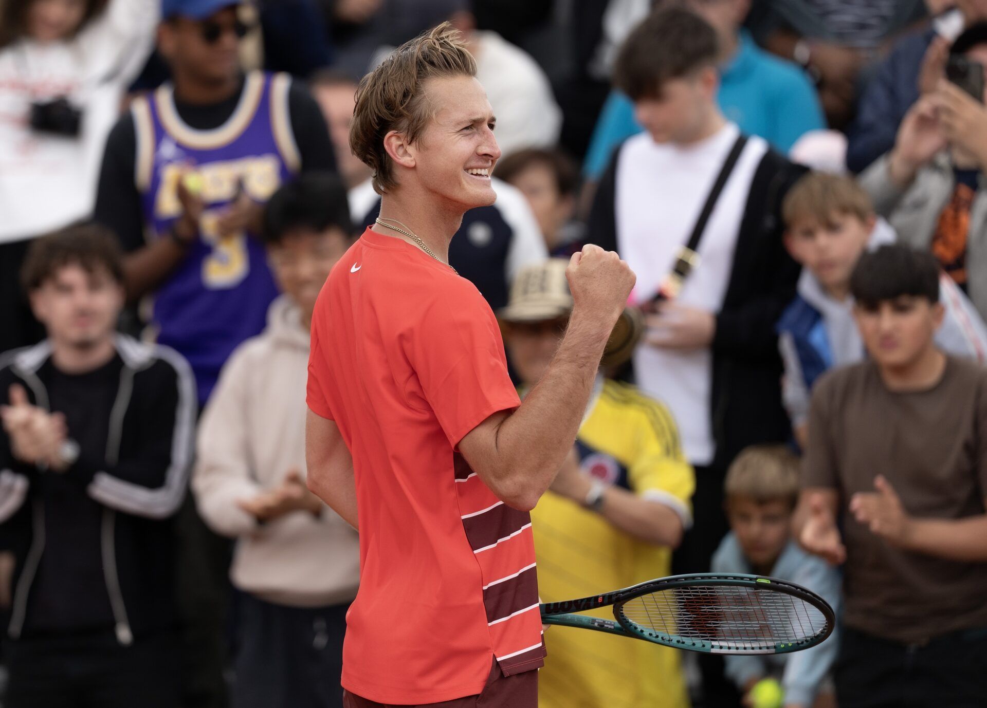 Sebastian Korda of the United States celebrates winning his match against Luciano Darderi of Italy on day two at Roland Garros Stadium.
